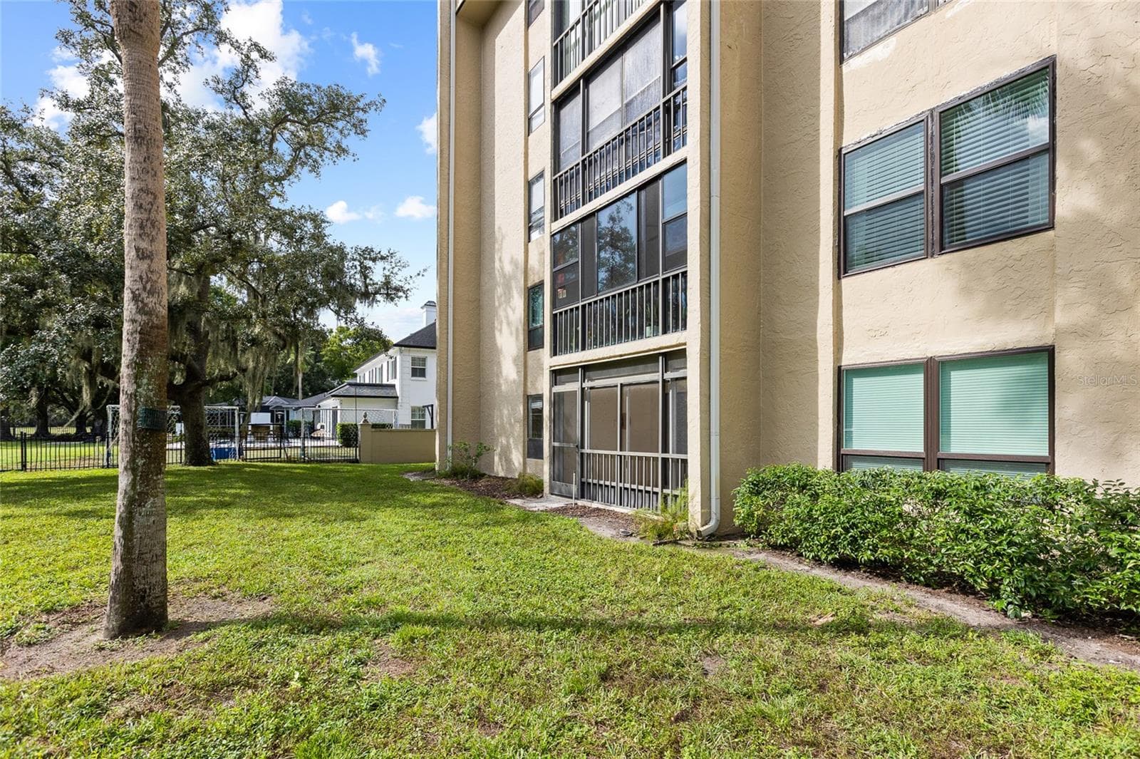 Building Exterior - Lanai - 13626 GREENFIELD DR #109, TAMPA
