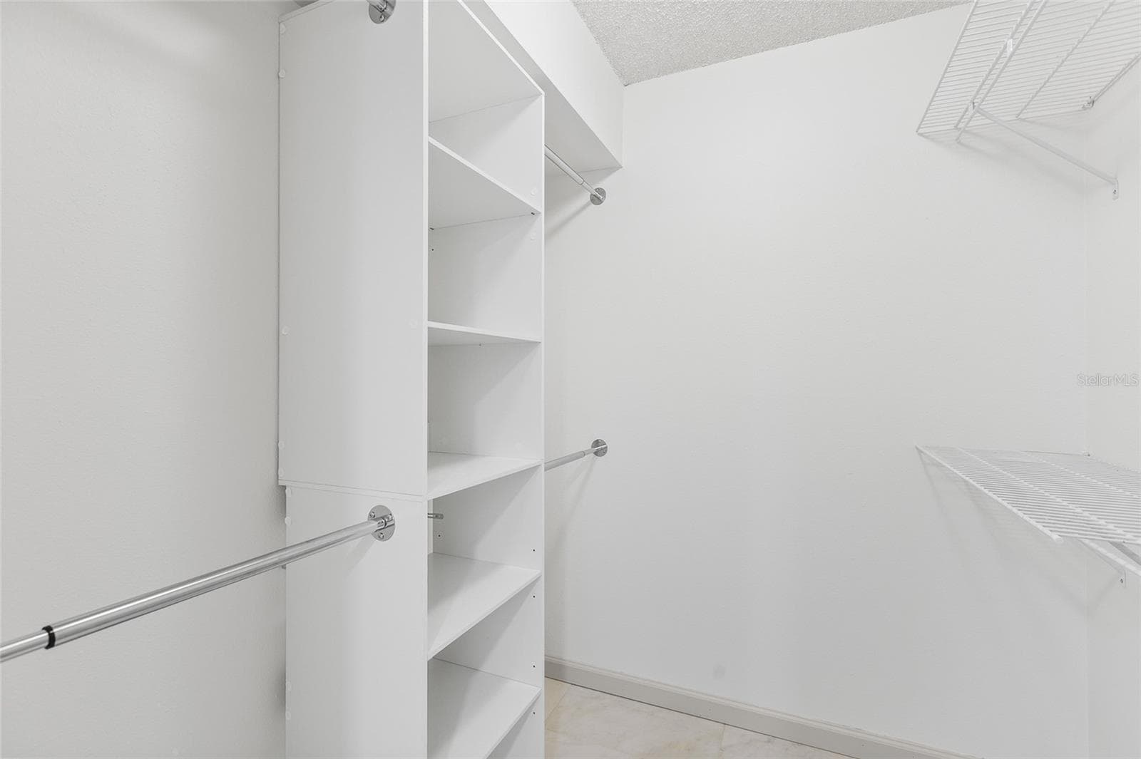 Primary Suite Walk-In Closet - 13626 GREENFIELD DR #109, TAMPA