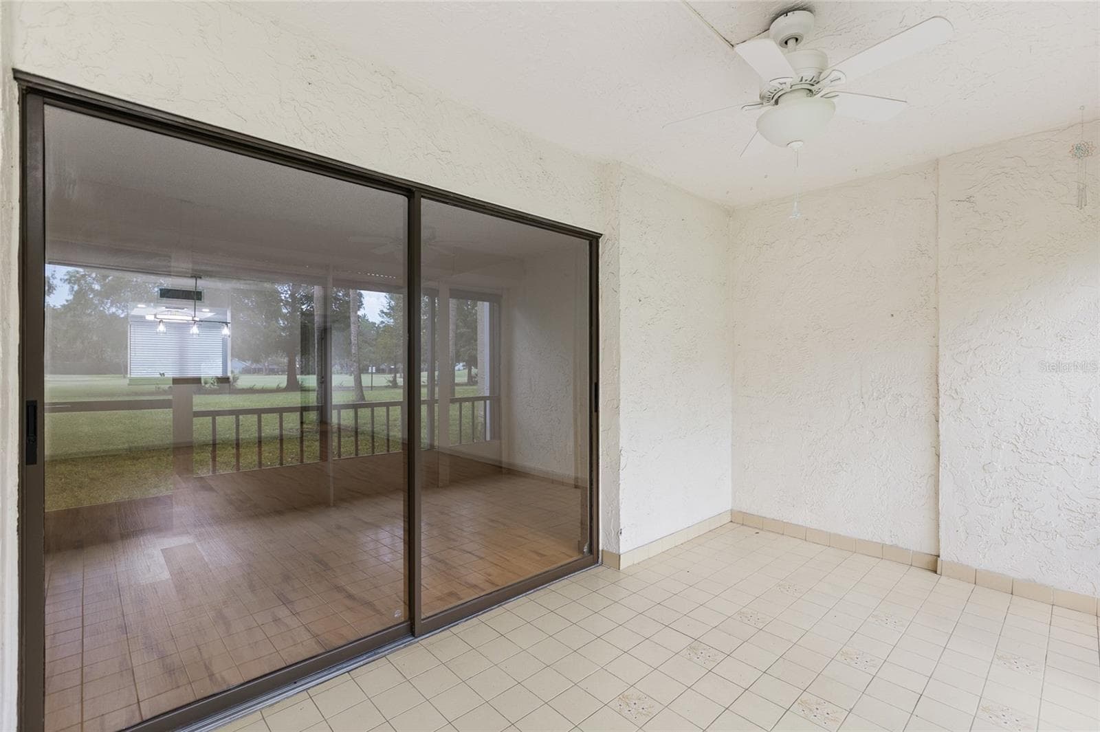 Covered Screened Patio - 13626 GREENFIELD DR #109, TAMPA