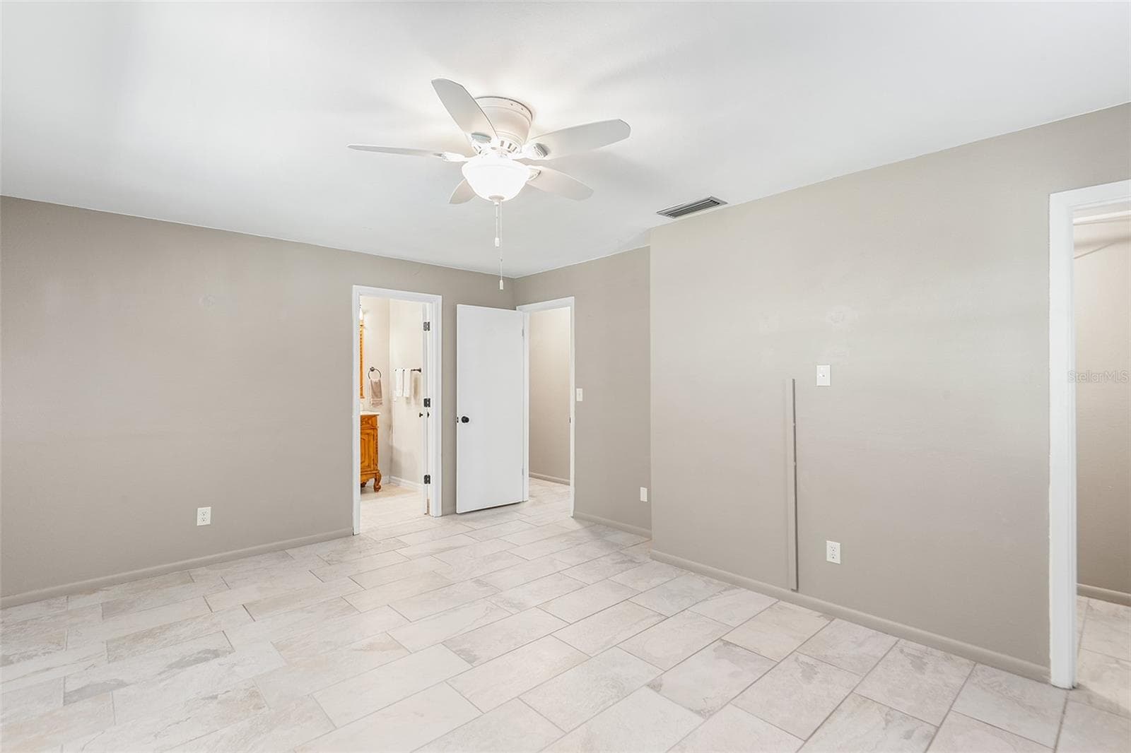 Primary Bedroom is light, airy and SPACIOUS! - 216 SHORE LOOP, WINTER HAVEN