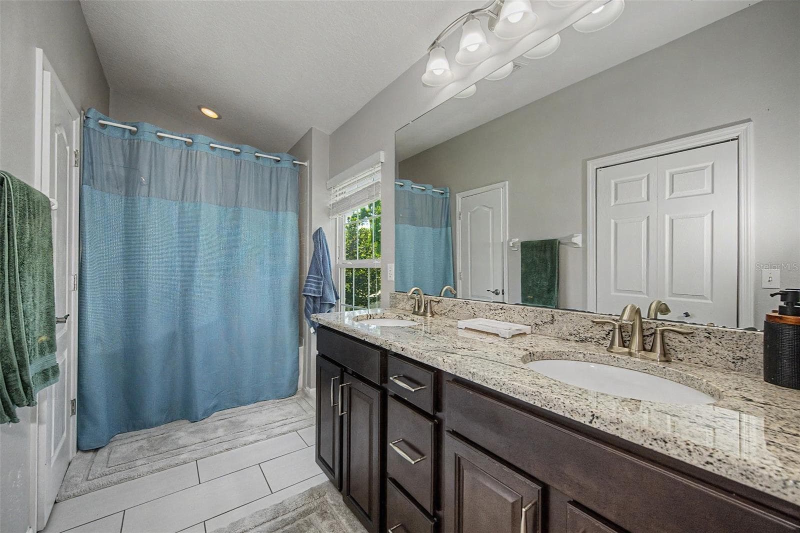 En suite bathroom with dual sinks - 7001 INTERBAY BLVD #142, TAMPA