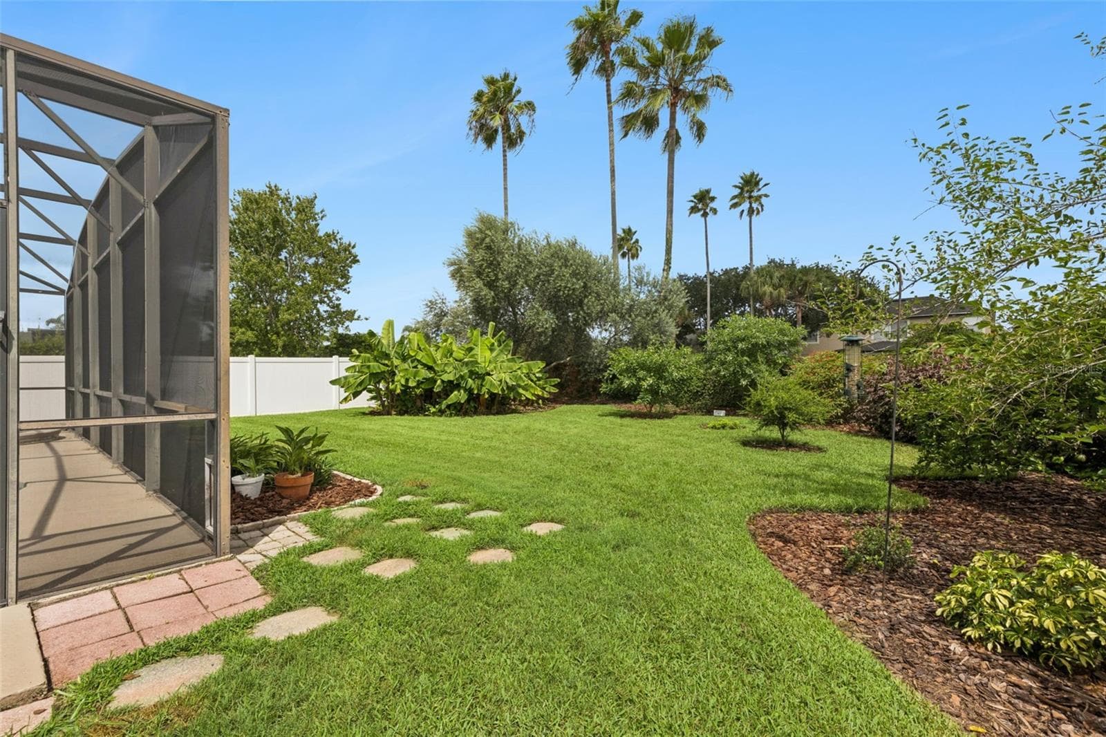 Landscaped Back Yard with Fruit Trees - 14639 RIVIERA POINTE DR, ORLANDO