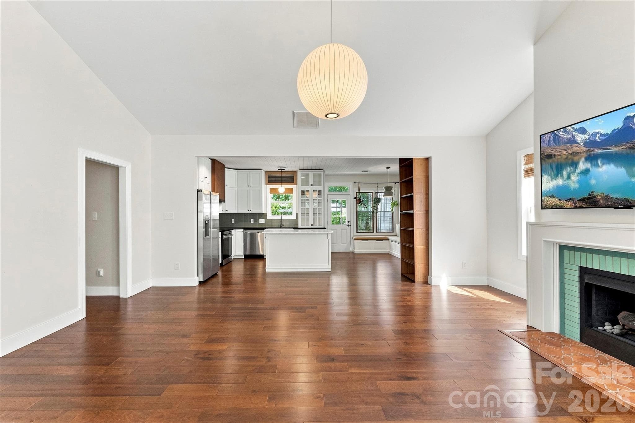 Open living area with vaulted ceiling - 14100 Garden District Row, Huntersville