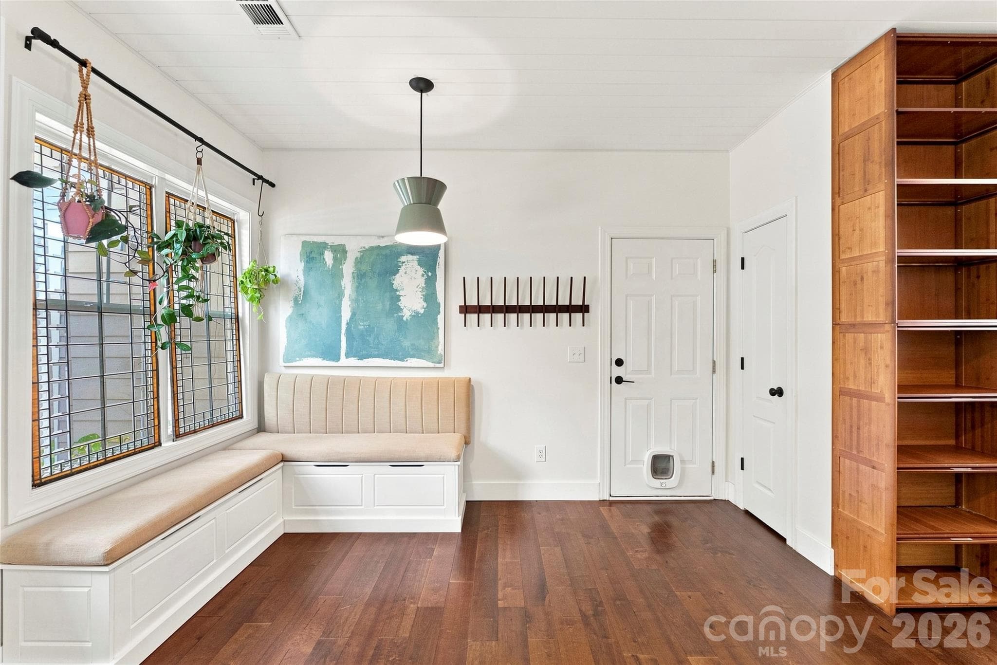 Breakfast nook with built-in bench seating - 14100 Garden District Row, Huntersville