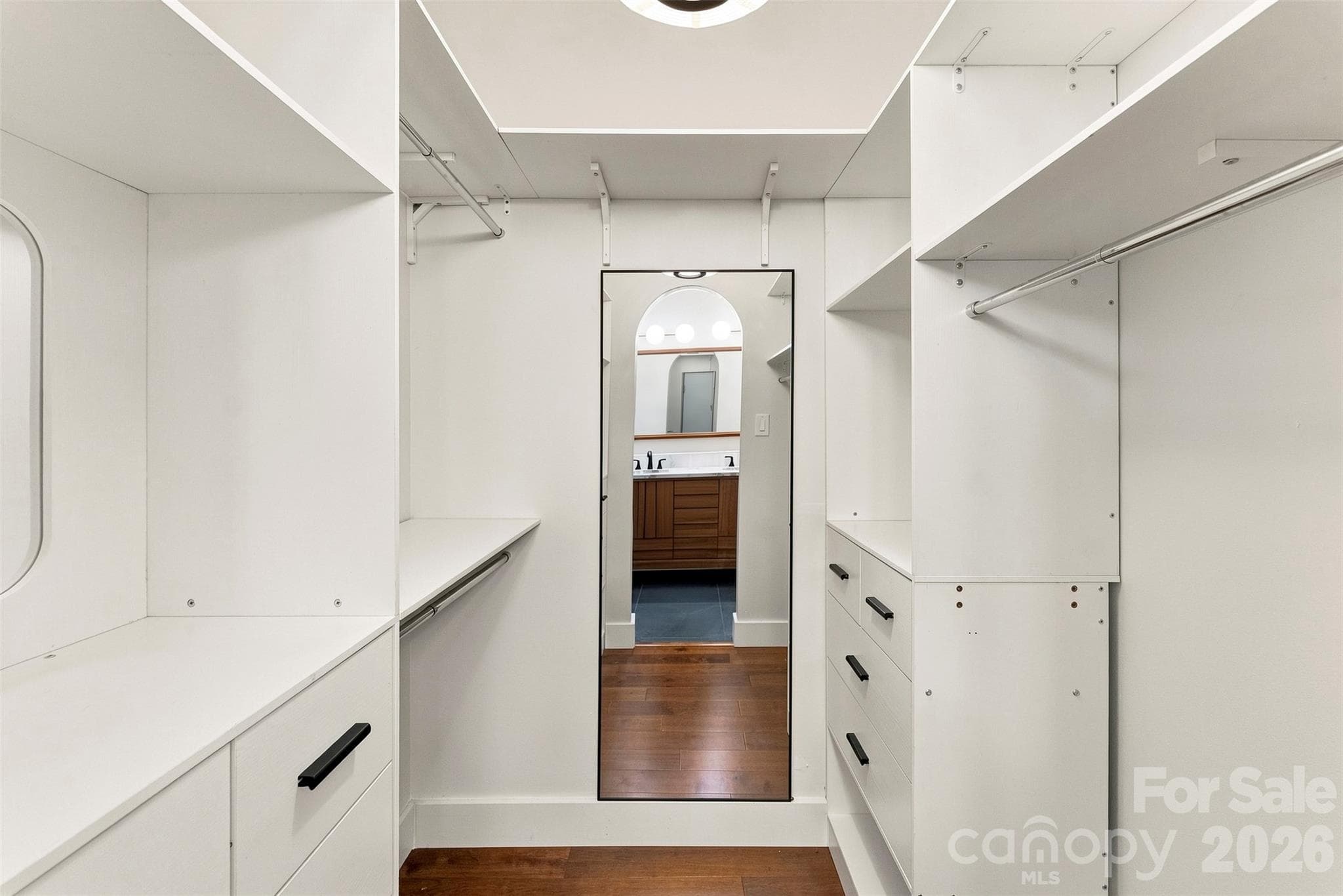 Spacious walk-in closet with built-in storage - 14100 Garden District Row, Huntersville