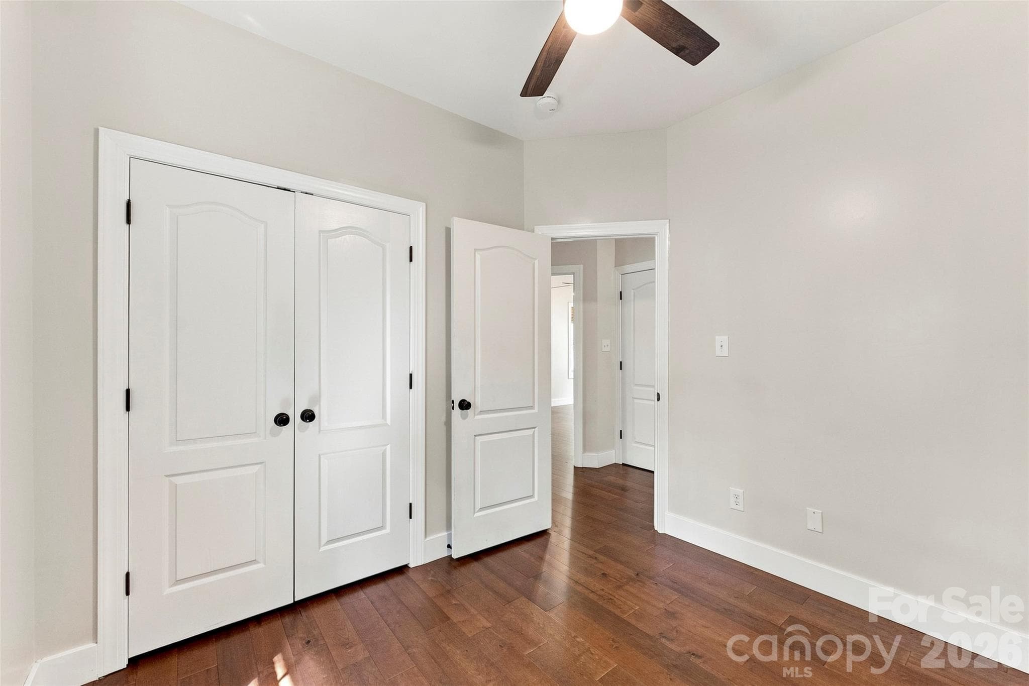 Third bedroom with double door closest - 14100 Garden District Row, Huntersville