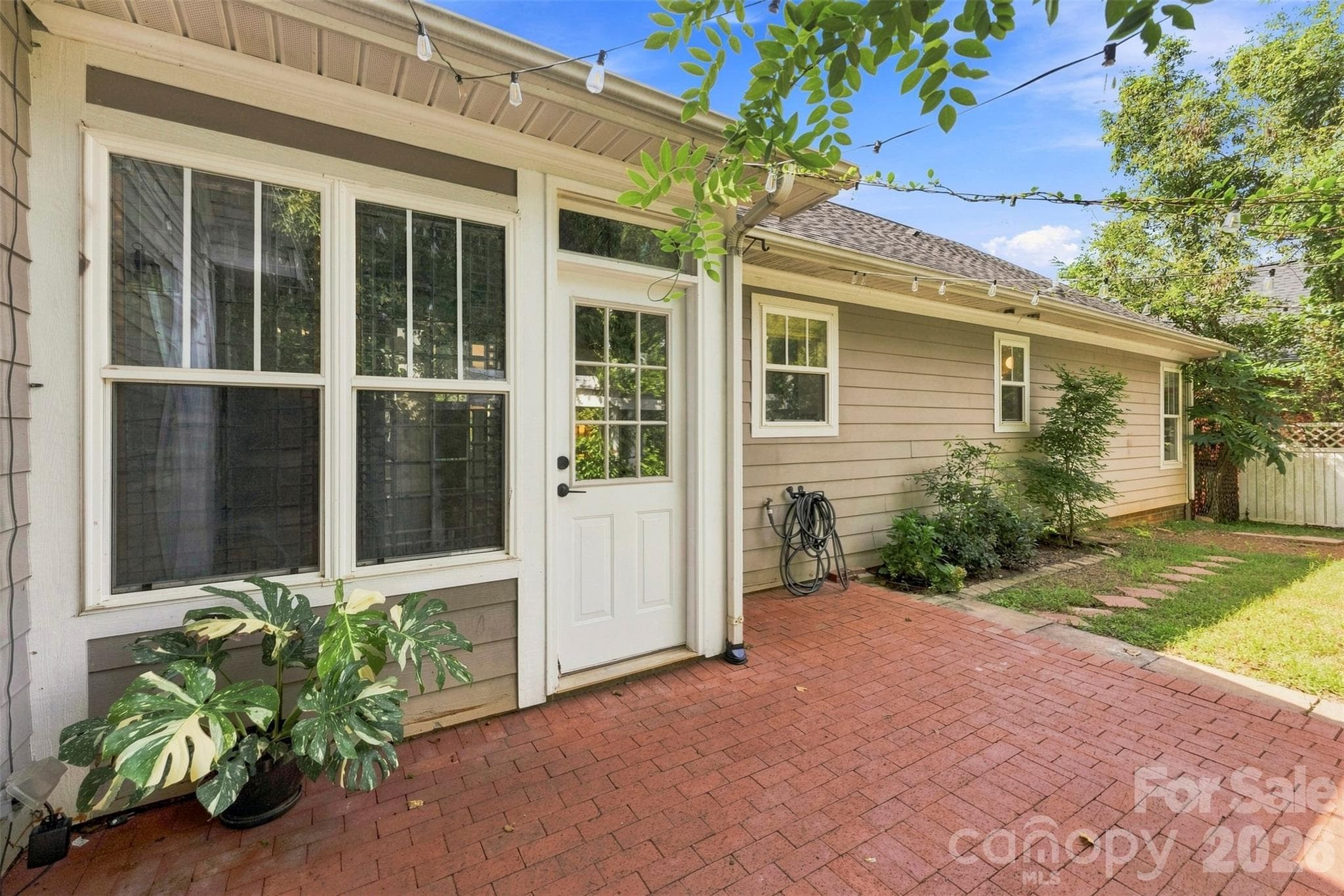 Brick Patio inside a fenced in back yard - 14100 Garden District Row, Huntersville