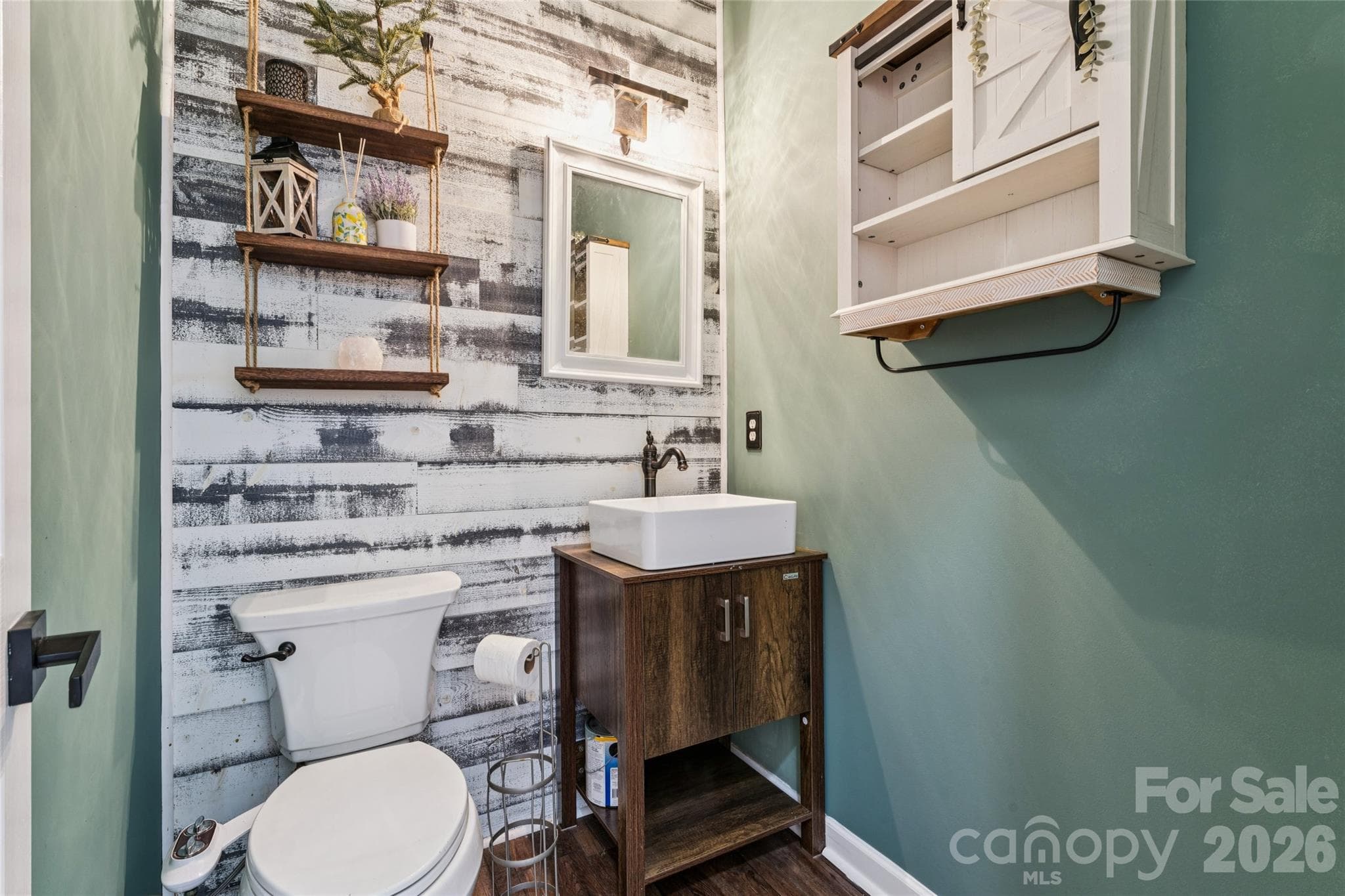 Main level 1/2 Bath privately located from the main living spaces. - 104 Planters Drive, Statesville