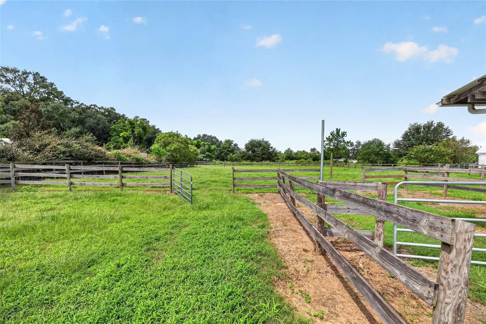 Pastures with Gates for easy access and movement amongst the livestock - 4256 SE 150TH ST, SUMMERFIELD