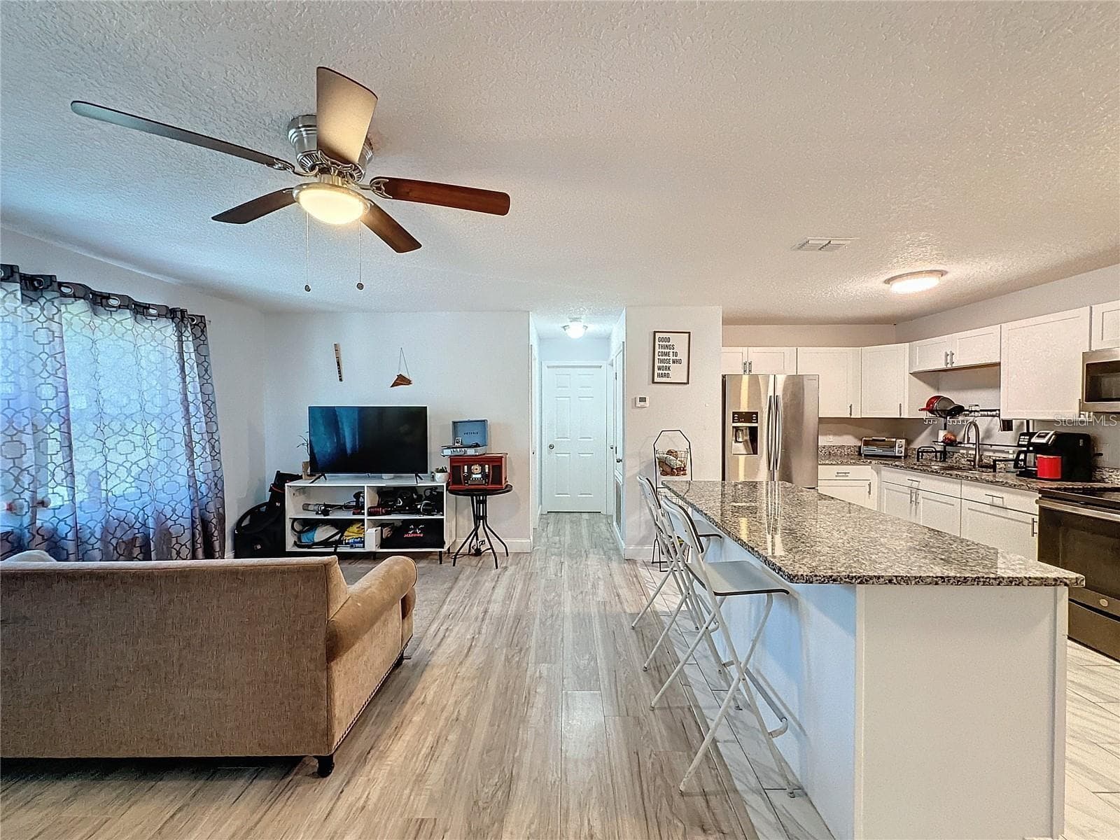 OPEN CONCEPT KITCHEN AND LIVING ROOM - 7211 PINION DR, ORLANDO