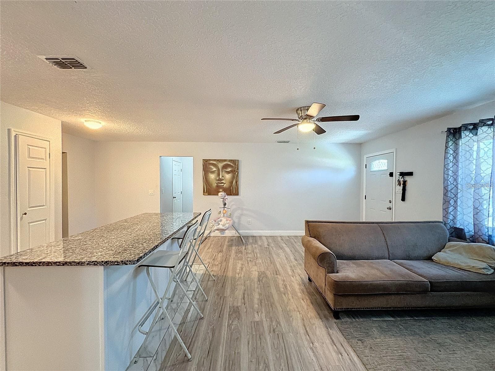 SIDE ANGLE LIVING ROOM BREAKFAST NOOK - 7211 PINION DR, ORLANDO