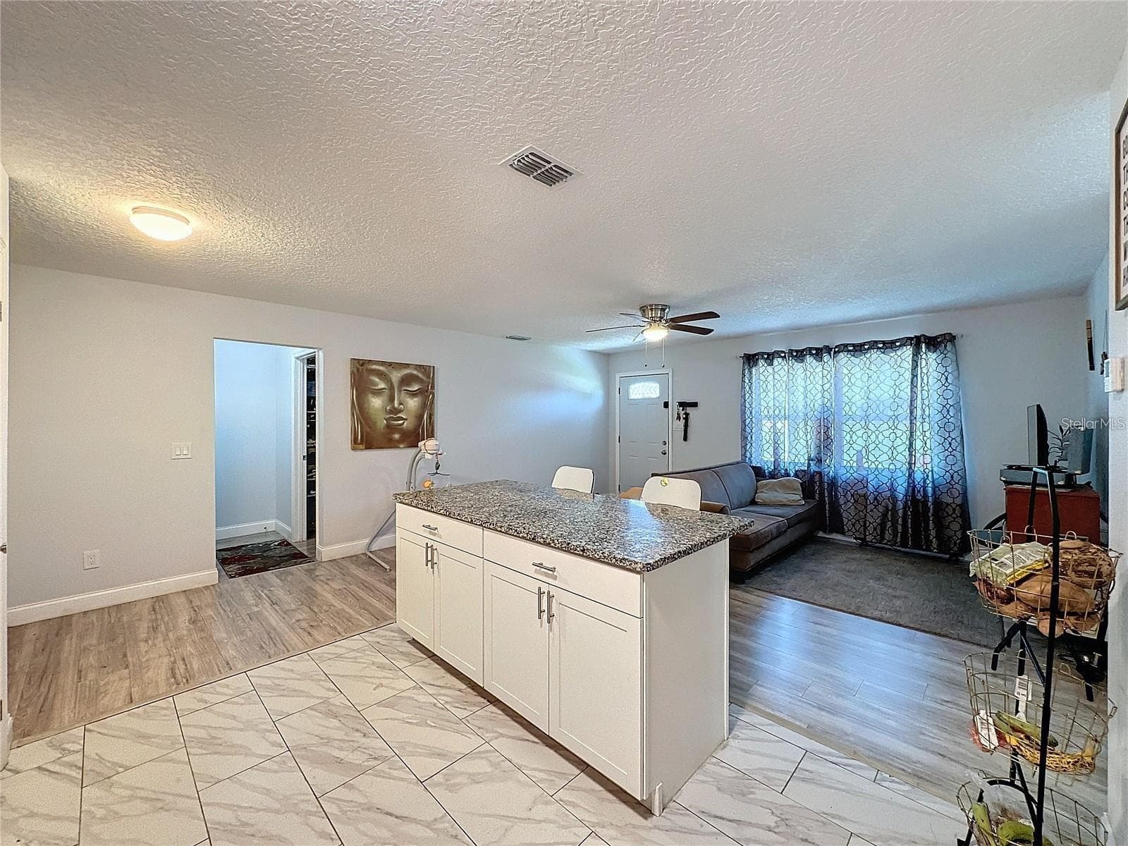 AGNLE FROM INSIDE KITCHEN - 7211 PINION DR, ORLANDO