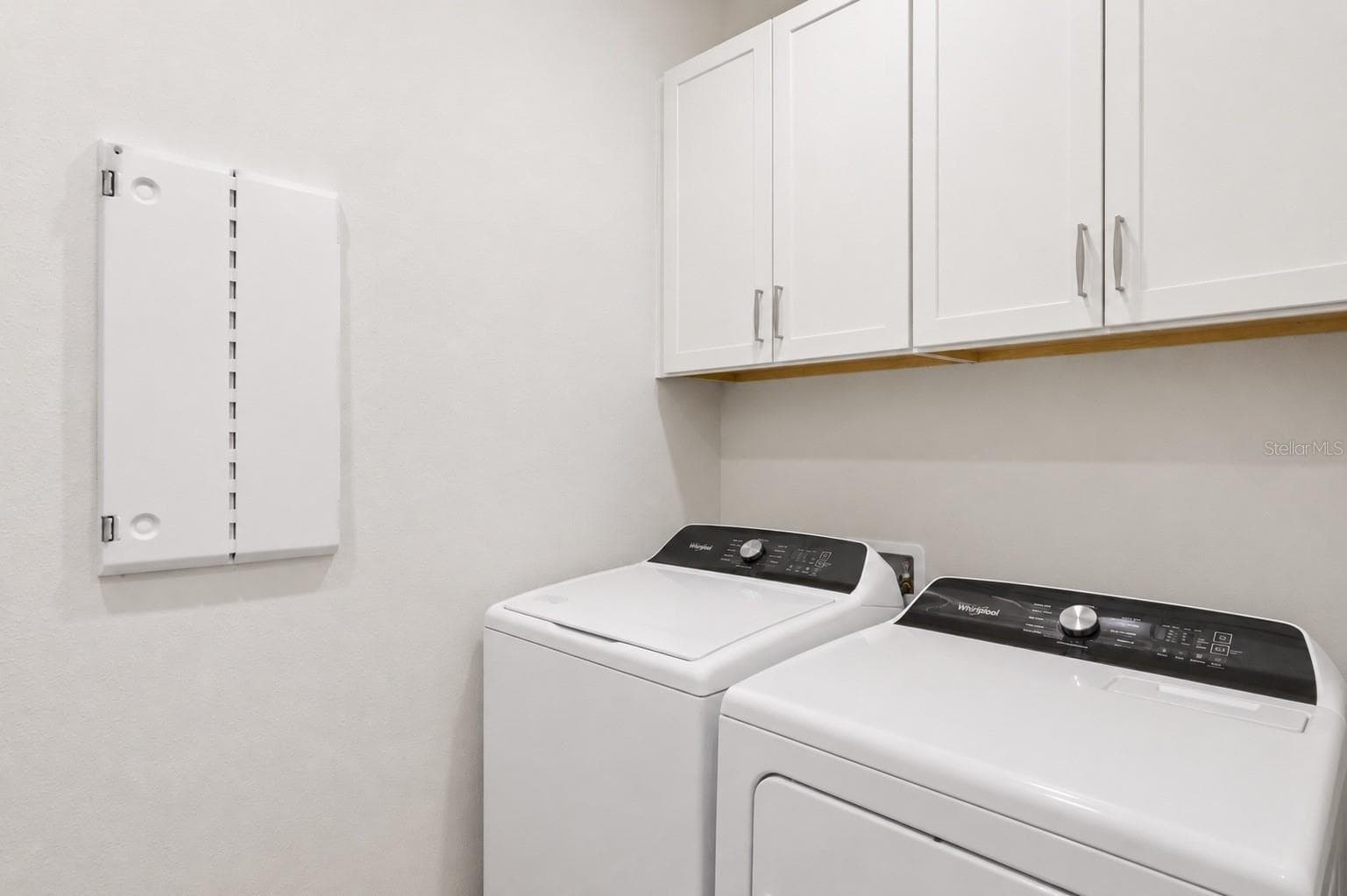 Laundry room with cabinets - 2511 PINE PRESERVE CT, ST CLOUD