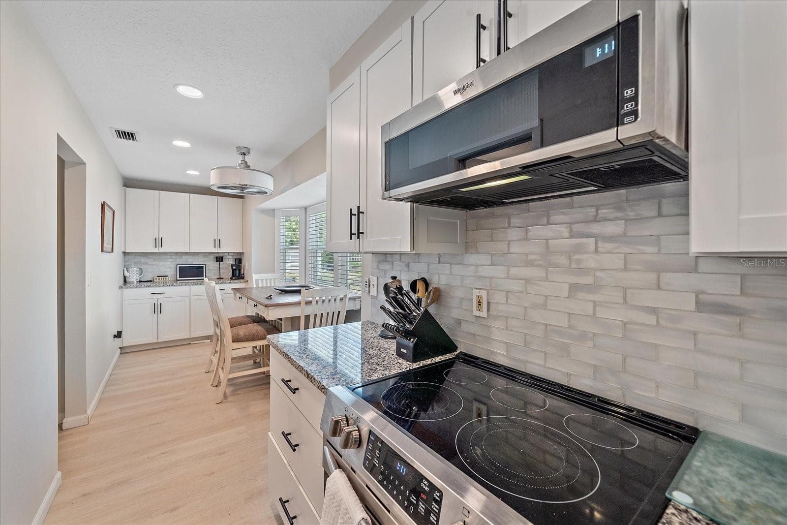 oven / eating area and end coffee counter and cabinets - 1488 JUPITER RD, VENICE