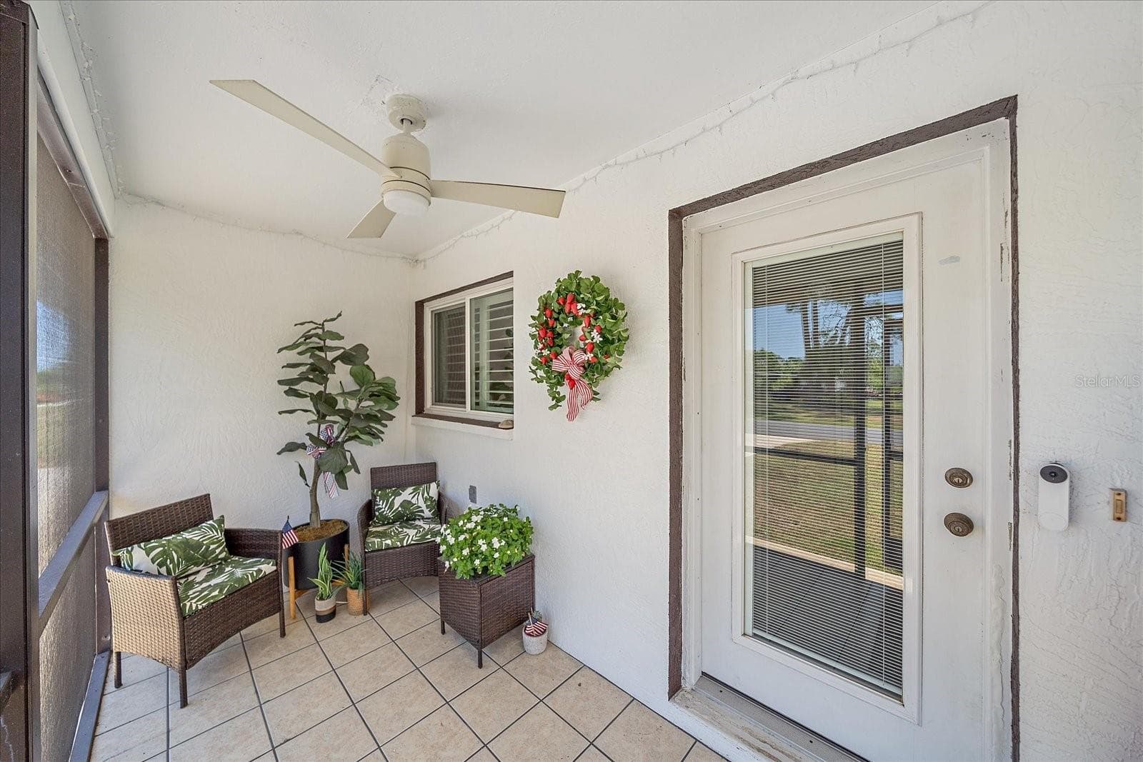 front door and screened porch - 1488 JUPITER RD, VENICE
