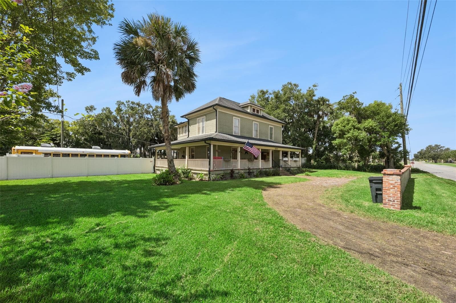 A large backyard with mature shade trees, firepit area and outbuildings creates a setting rarely found this close to Sanford. - 2201 CELERY AVE, SANFORD