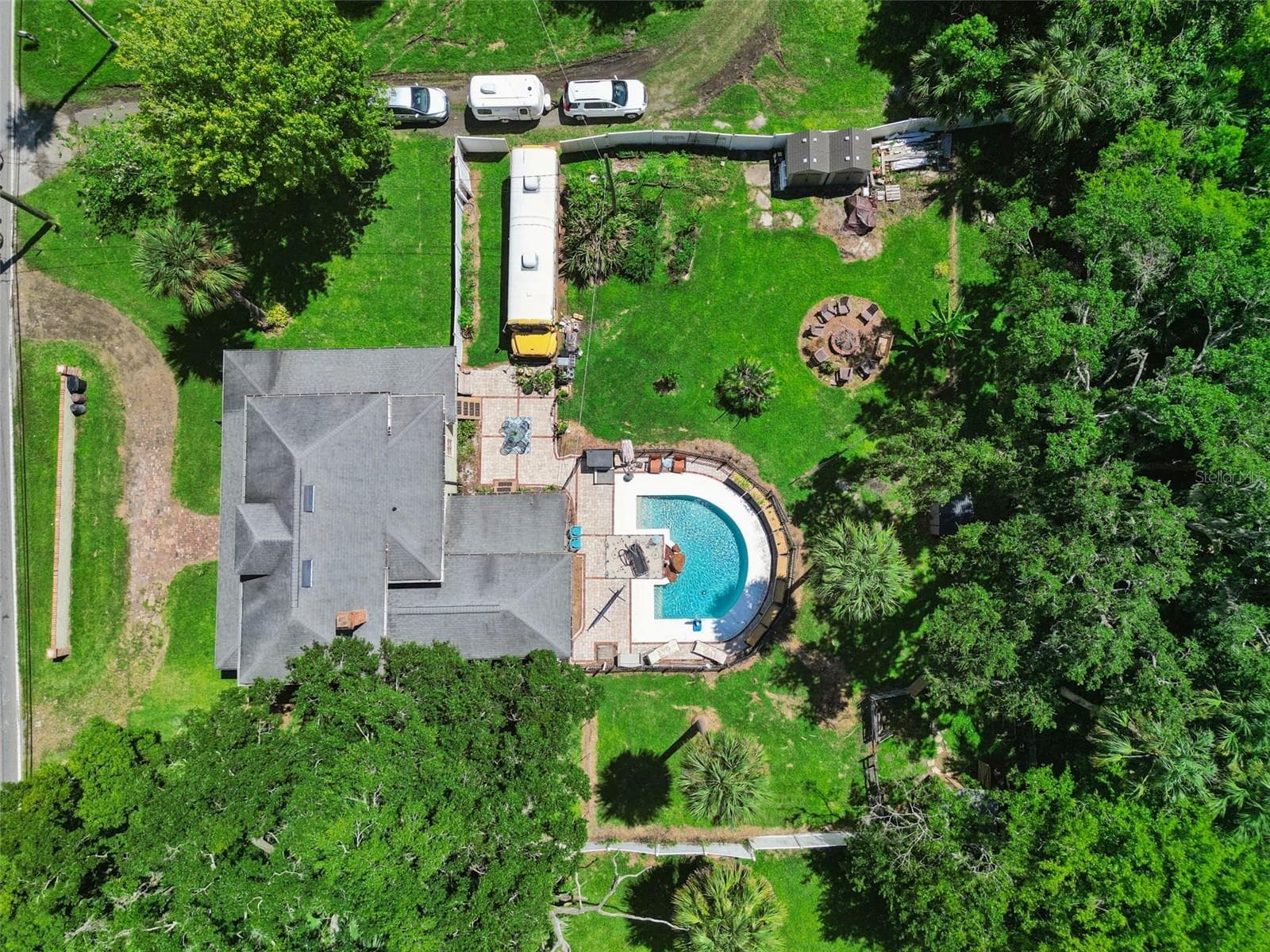 From above, the property's scale becomes clear: a substantial historic home, private pool, outdoor living areas and expansive grounds. - 2201 CELERY AVE, SANFORD
