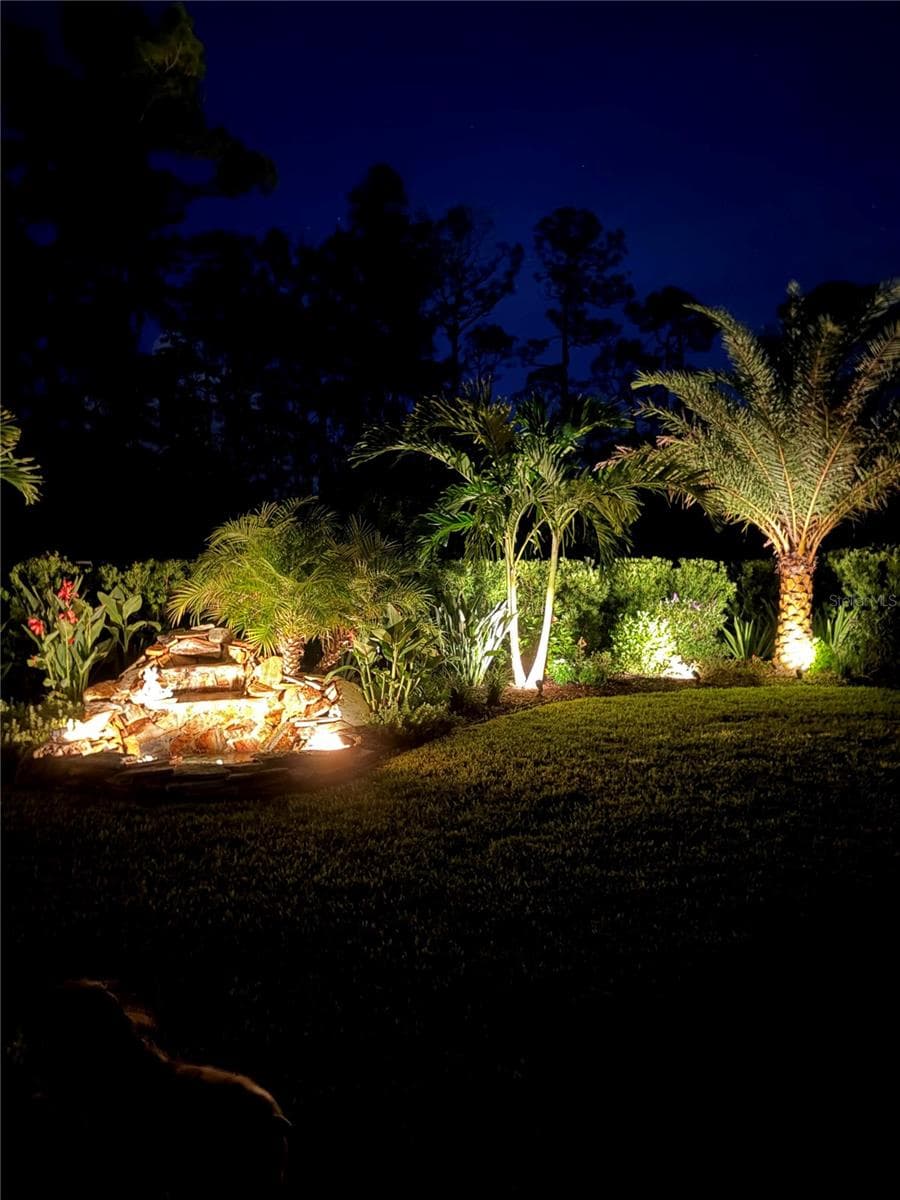 Backyard at night - 2511 PINE PRESERVE CT, ST CLOUD