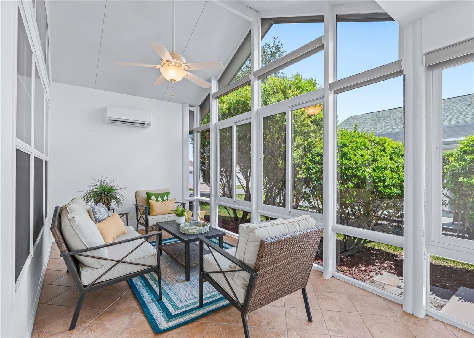 A fabulous BONUS—this additional 297 SQ. FT. ENCLOSED FLORIDA ROOM is air conditioned and surrounded by windows, creating a bright and comfortable year-round living space. - 17601 SE 81ST TIMBERWOOD TER, THE VILLAGES