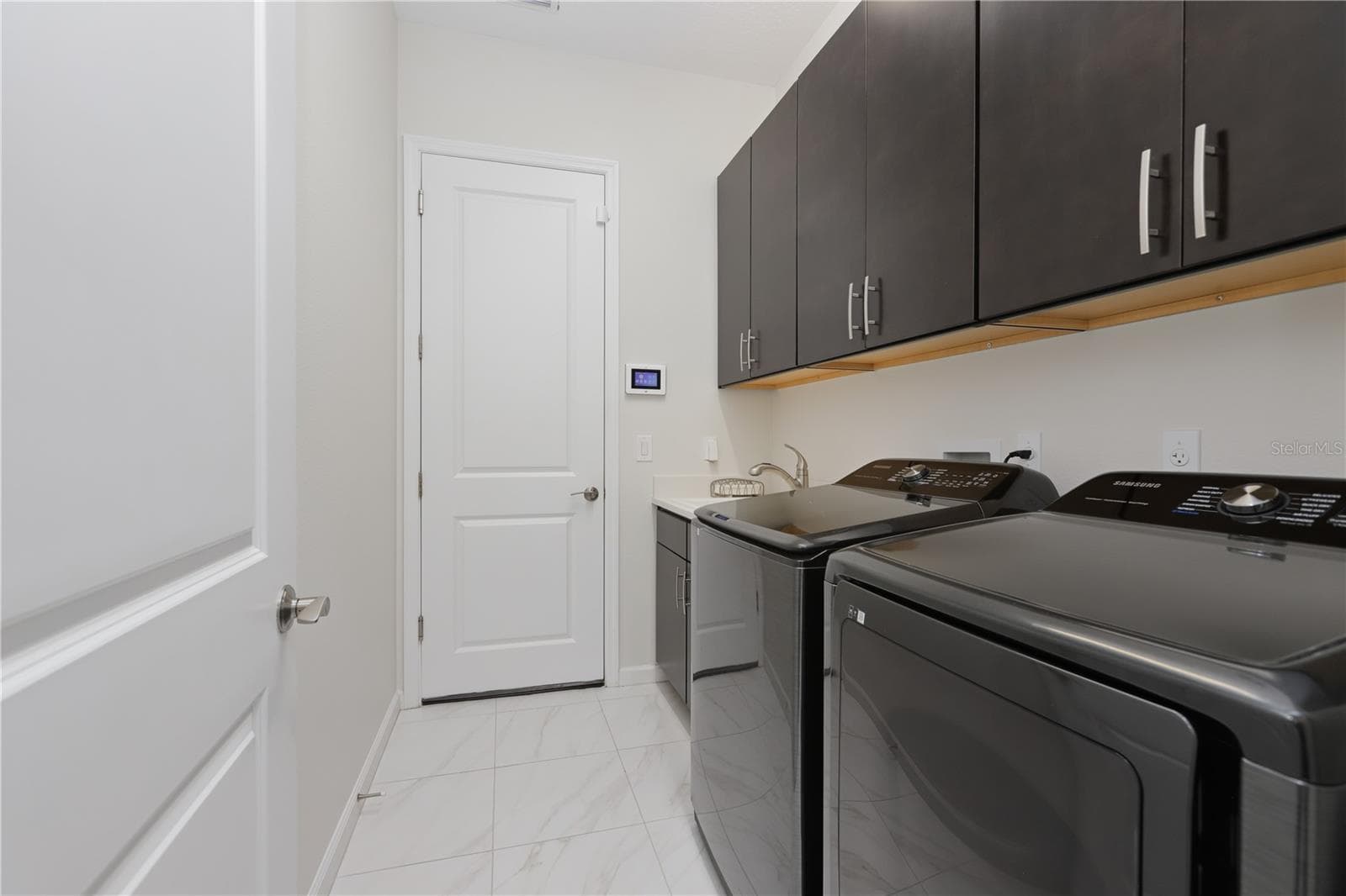 Inside Laundry Room - 114 IVYDALE MANOR DR, DELAND