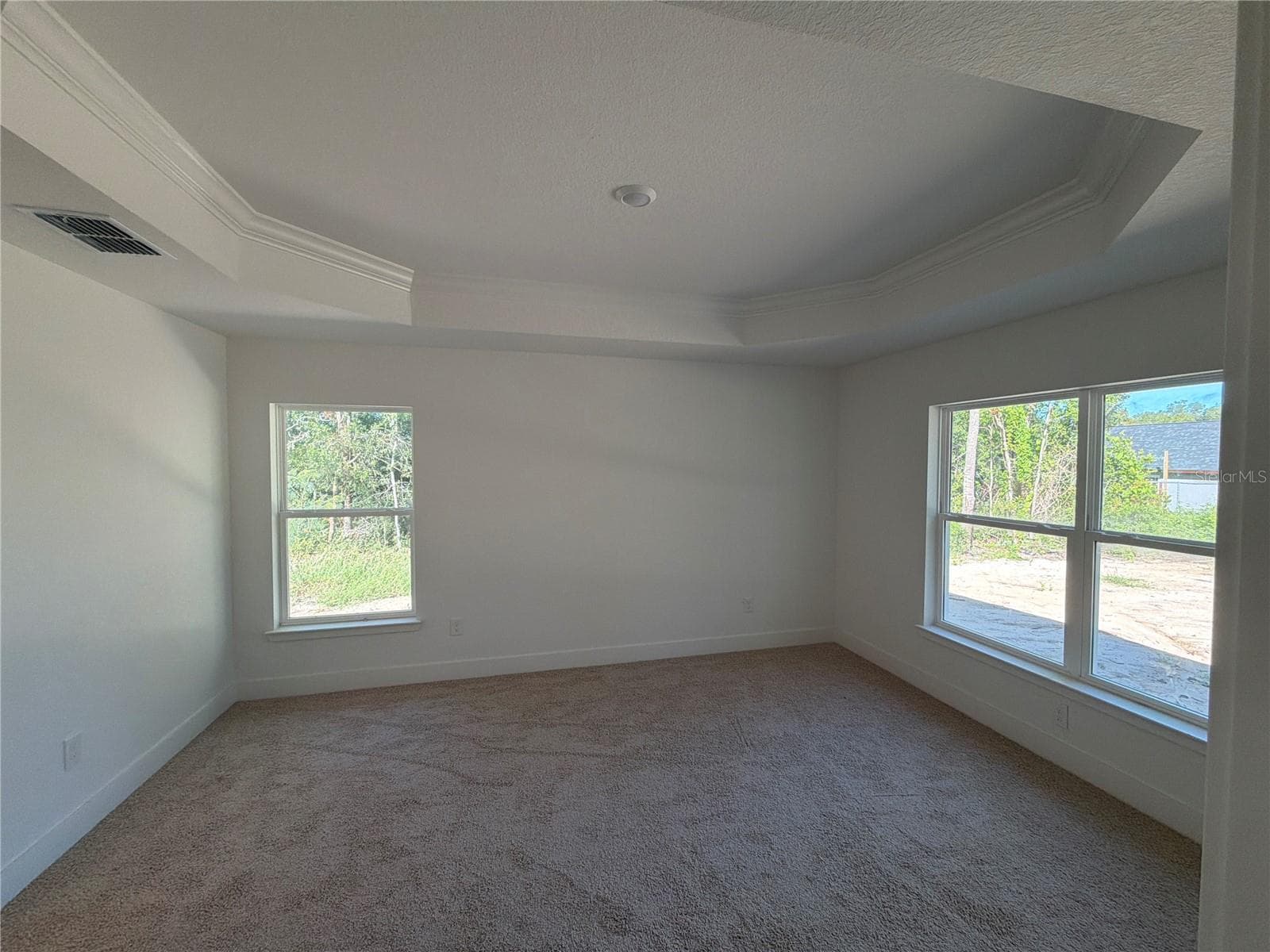 Under construction. Current state of build as of 9-5-26. Master Bedroom. - 7 BAHIA PASS LN, OCALA