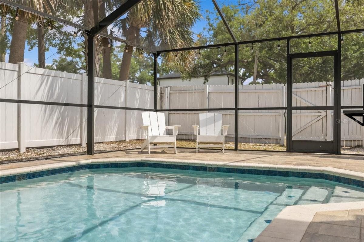 Single Family Residence at 7318 S KISSIMMEE ST, TAMPA, photo 2 of 40