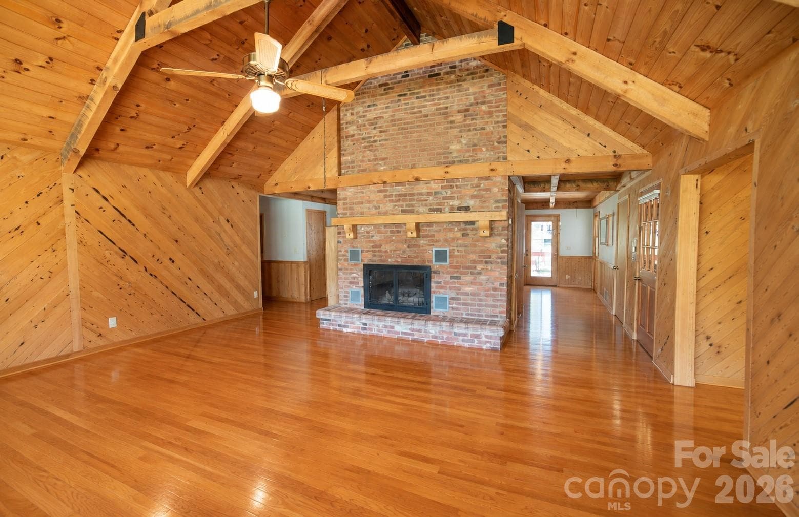 Living Room's  Soaring Brick FP - 1368 Cajah Mountain Road, Hudson