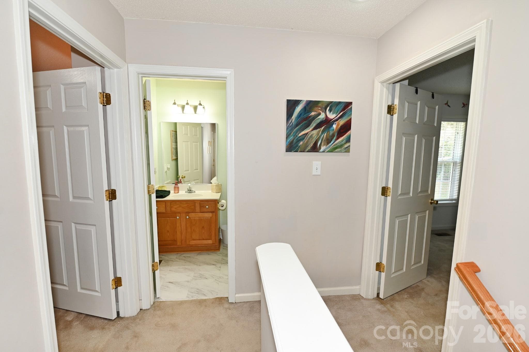 Let's head upstairs. Bedroom 2 and 3 on left and right, full bathroom in the middle - 236 17th Avenue SE, Hickory