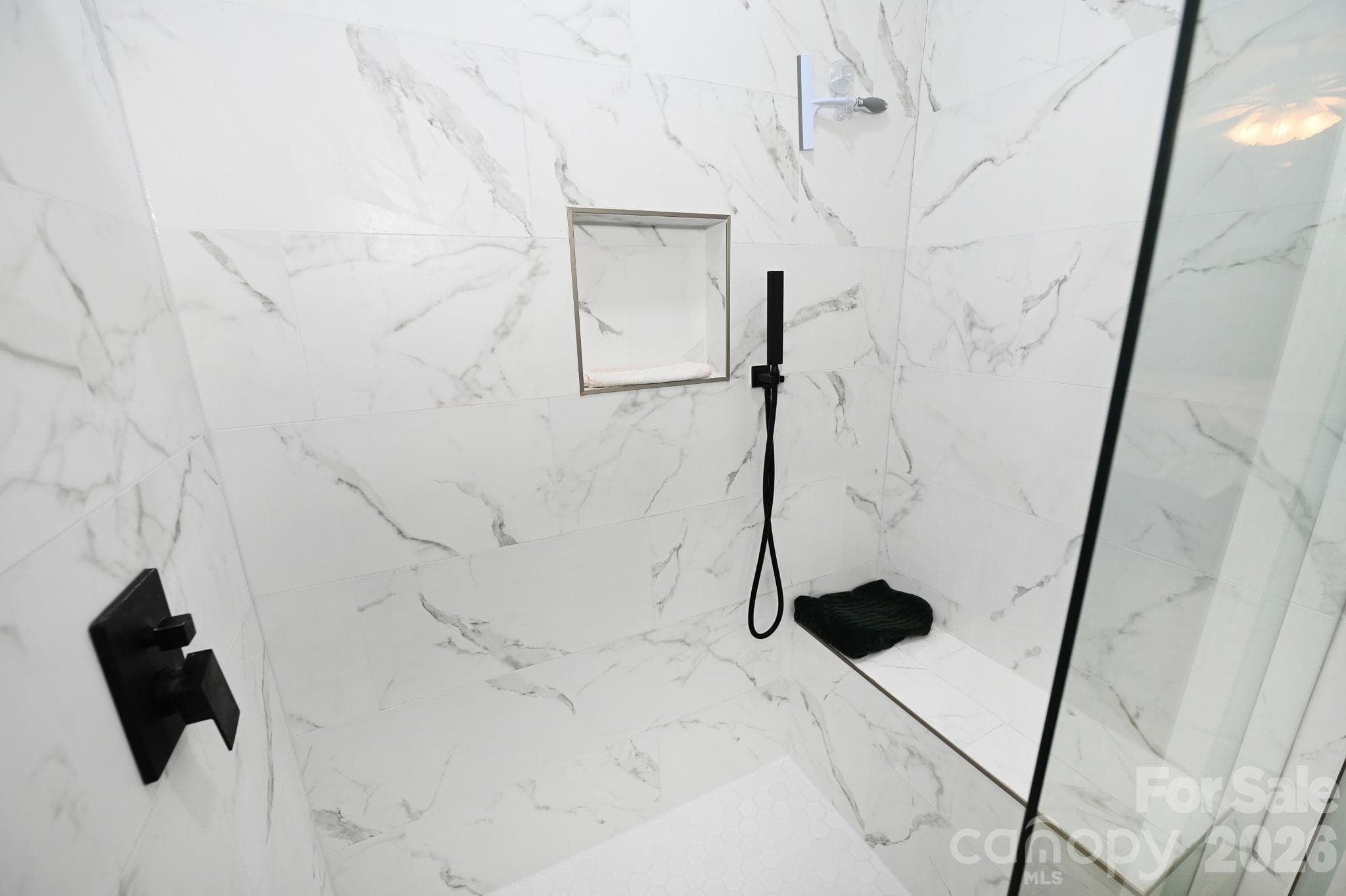 Primary shower with bench and niche - 236 17th Avenue SE, Hickory