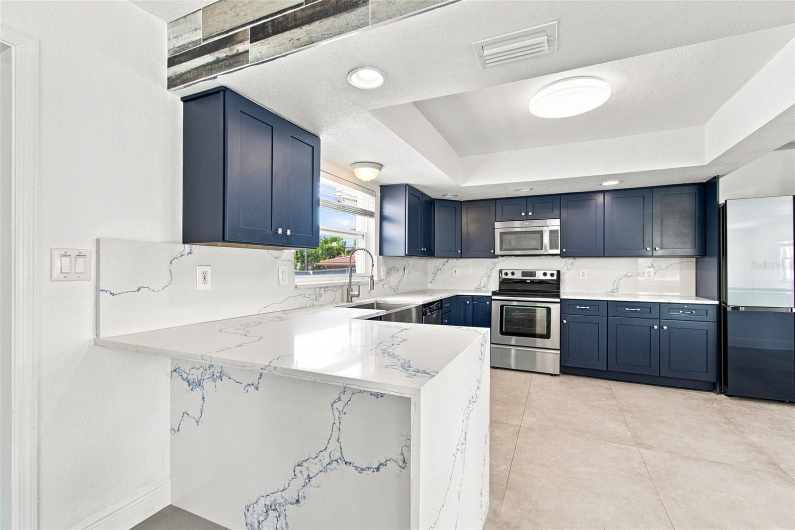 Single Family Residence at 112 16TH ST, BELLEAIR BEACH, photo 11 of 61