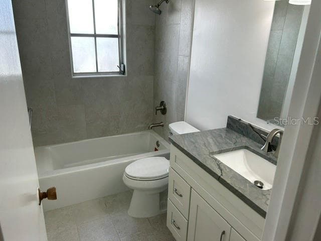 Bathroom with Granite Counters, Tile Flooring and a Tiled Shower/Tub surround - 2873 S OSCEOLA AVE #A5, ORLANDO