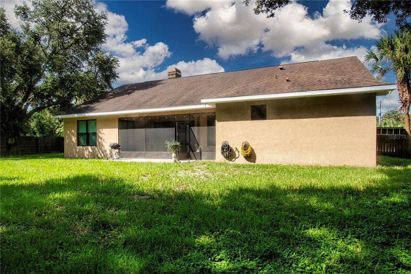 Back view ofhome - 1605 BUTCH CASSIDY TRL, WIMAUMA