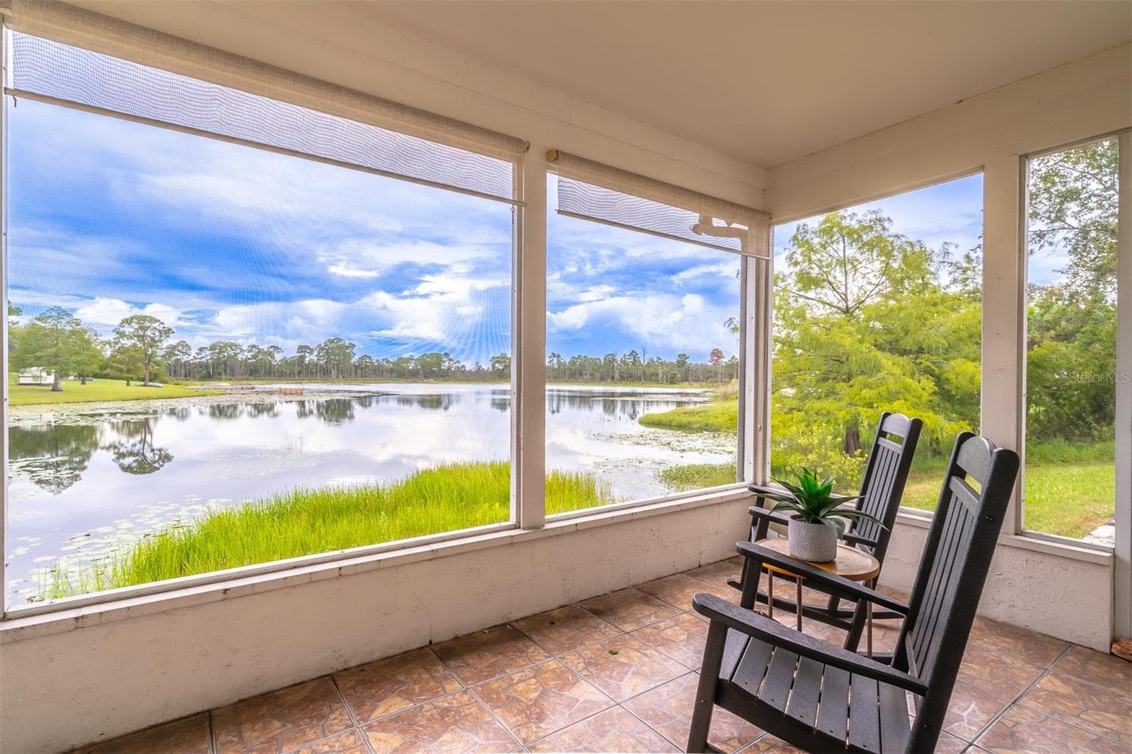 This spot in the home faces the West. This is a wonderful spot to enjoy a cup of coffee in the morning, or watch the sun go down. - 2366 SALEM DR, DELTONA