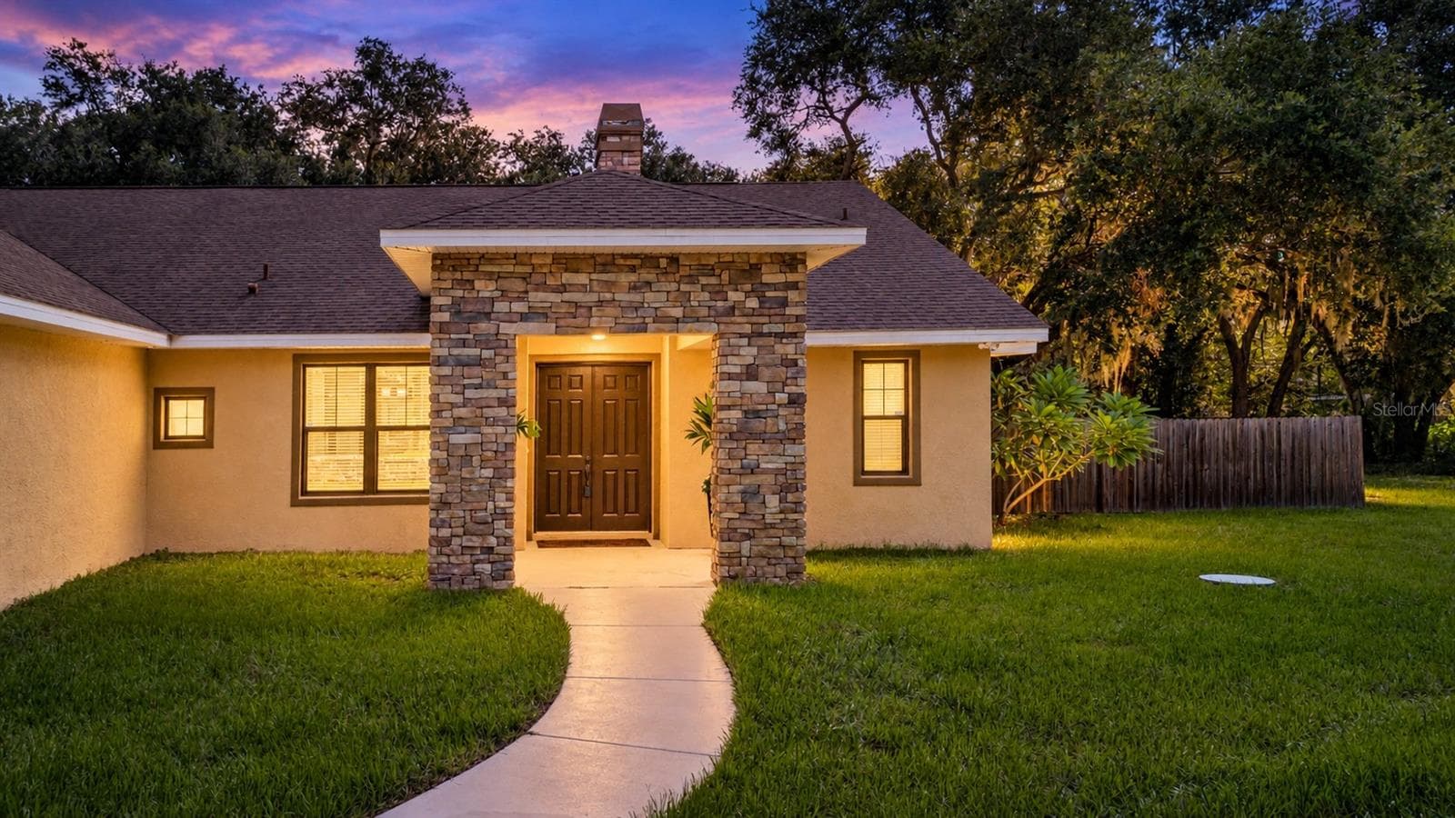 Twilight of front entry - 1605 BUTCH CASSIDY TRL, WIMAUMA