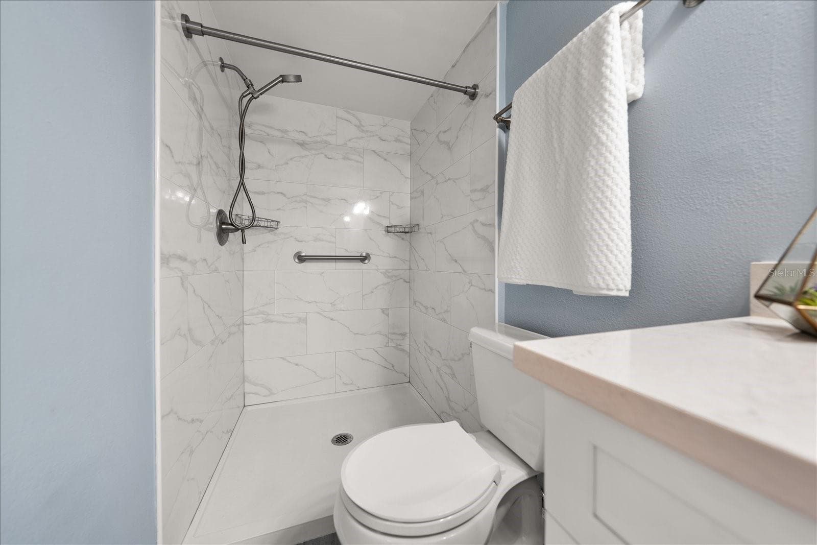Primary bath totally updated with newer shower, vanity, toilet, flooring, etc. - 403 MINDY DR #403, LARGO