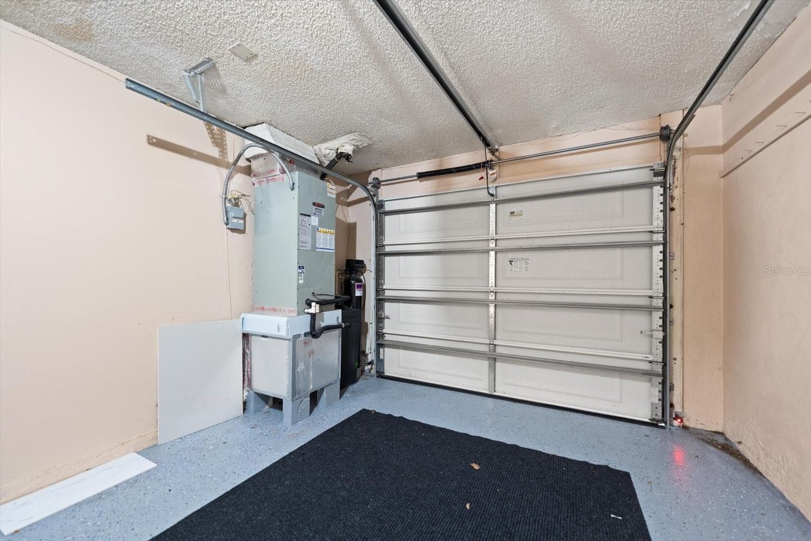 Garage with garage door opener, repainted flooring, water softener, etc. - 403 MINDY DR #403, LARGO