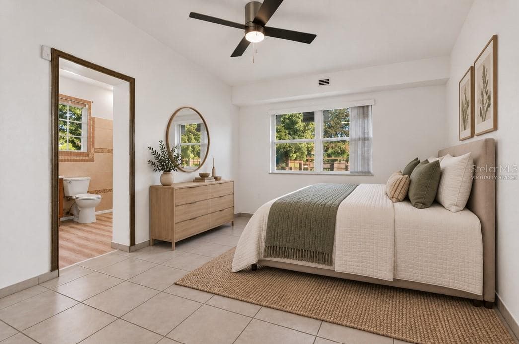 virtually staged primary bedroom - 208 PALMYRA DR, ORLANDO