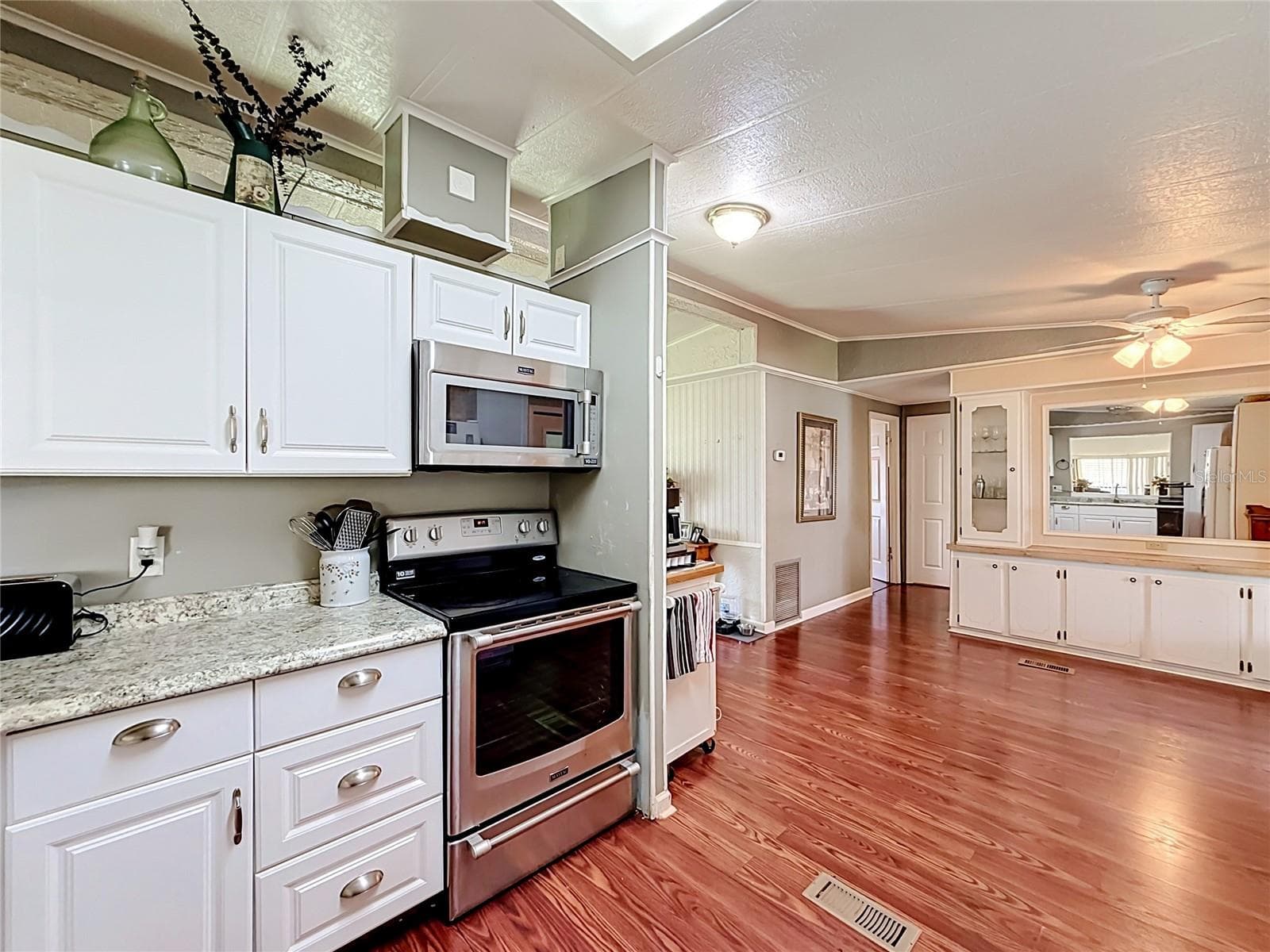 Kitchen to Breakfast Area - 1157 CAPELLA DR, TAVARES