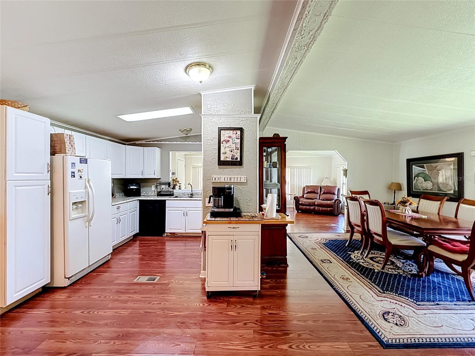 Kitchen to Dining Room - 1157 CAPELLA DR, TAVARES