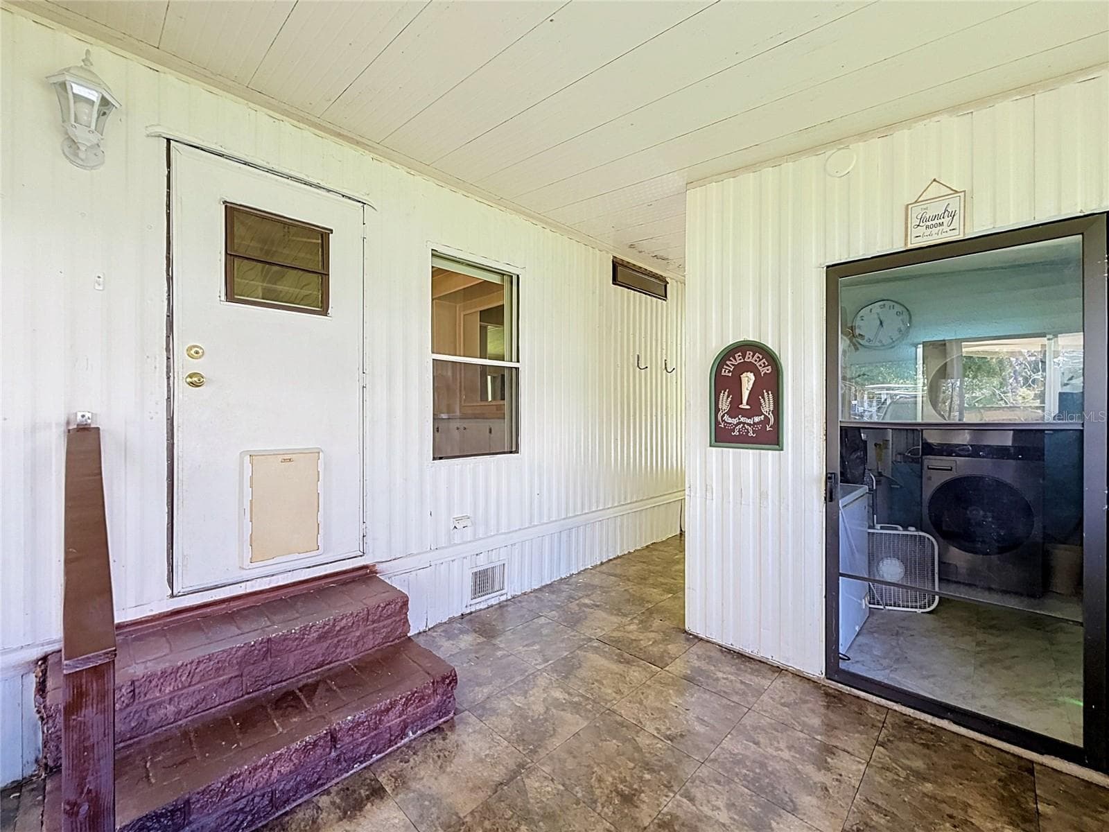 Entrance from Patio to Kitchen - 1157 CAPELLA DR, TAVARES