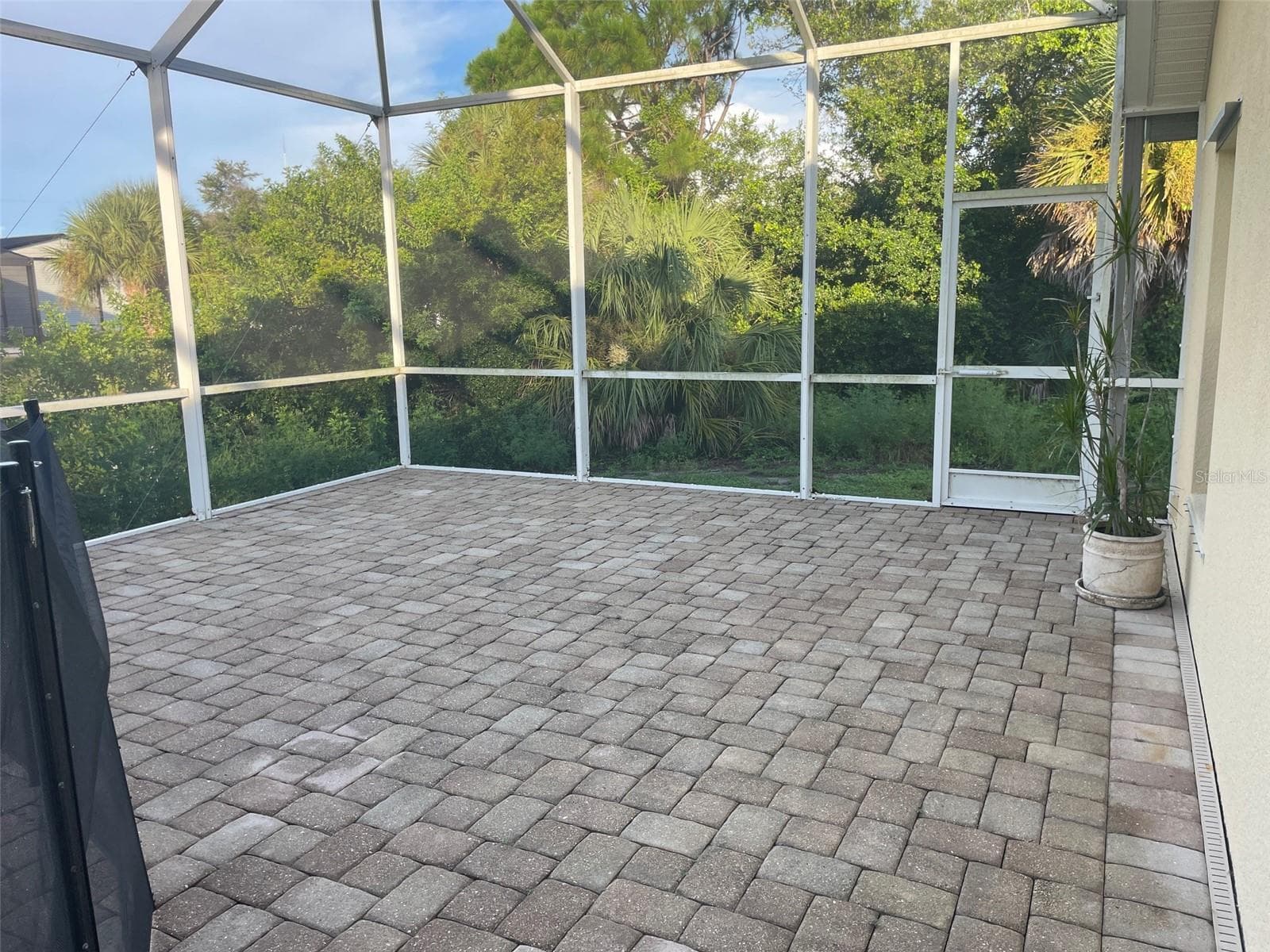 Patio under screen for cooking out or sun bathing - 13481 TRASCORO LN, PORT CHARLOTTE
