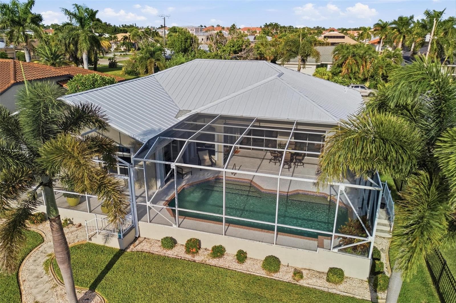 80 feet of seawall maintained by the city - 209 DIVINCI DR, PUNTA GORDA