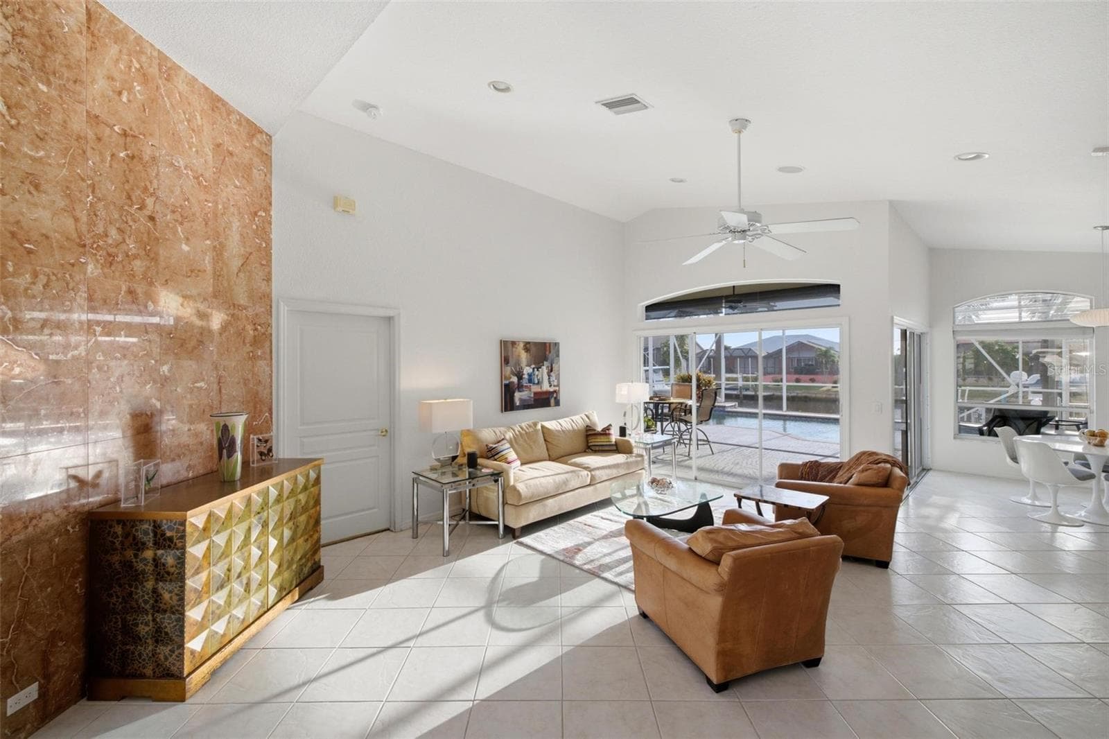Cathedral ceilings and open floor plan makes this home so light - 209 DIVINCI DR, PUNTA GORDA
