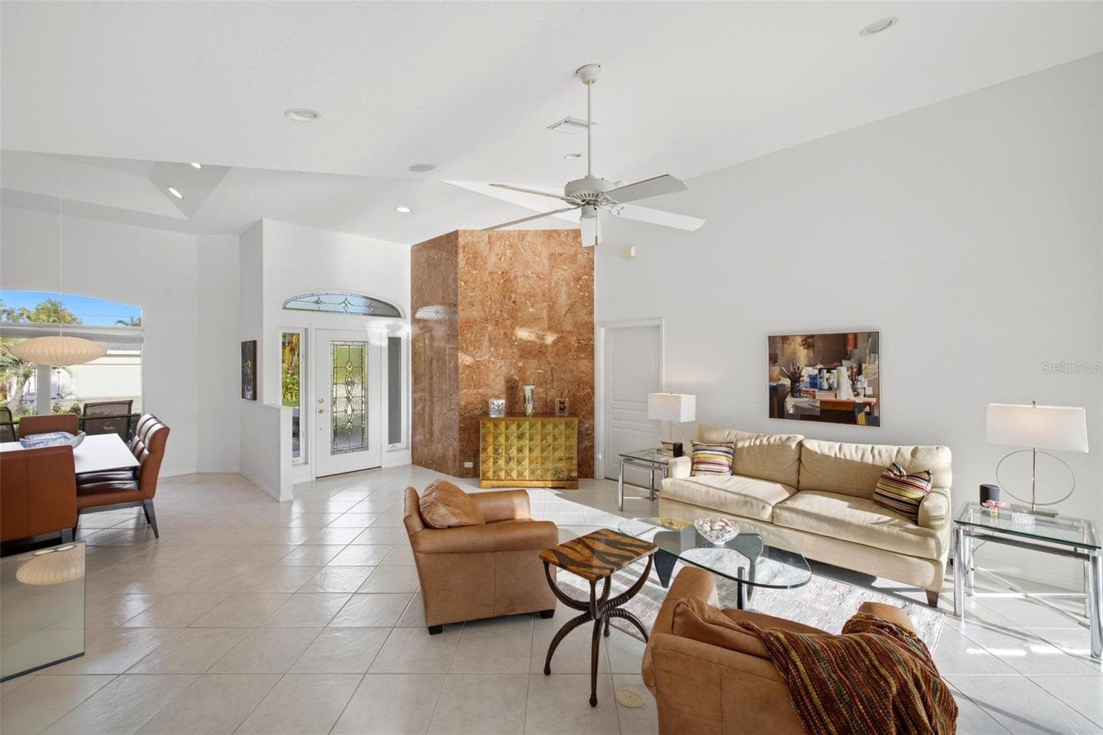 formal style living area great for greeting guests with a spacious dining room for entertaining. - 209 DIVINCI DR, PUNTA GORDA