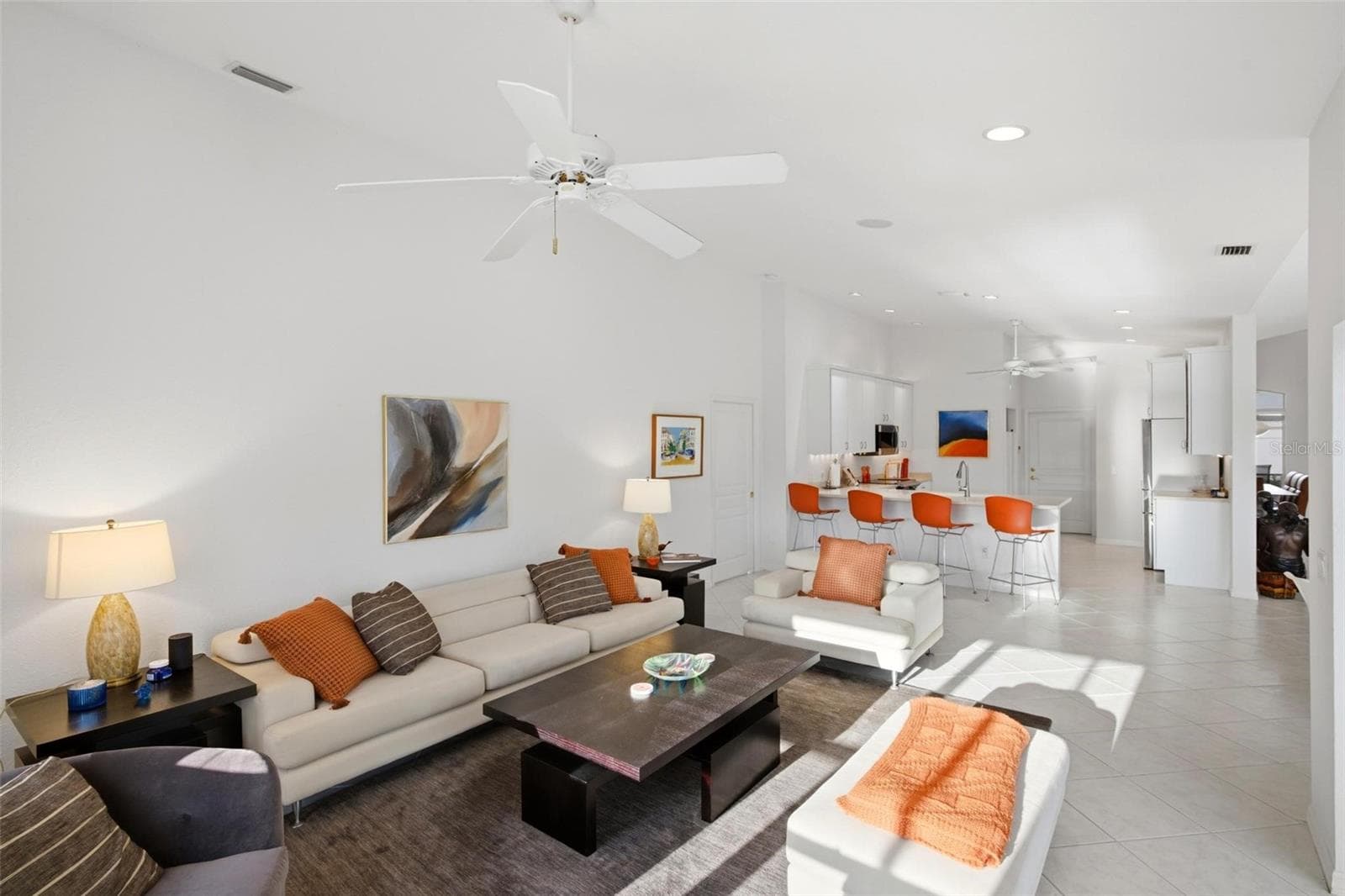 family room is next to the kitchen and is all open, so you can effortlessly entertain indoors and out - 209 DIVINCI DR, PUNTA GORDA