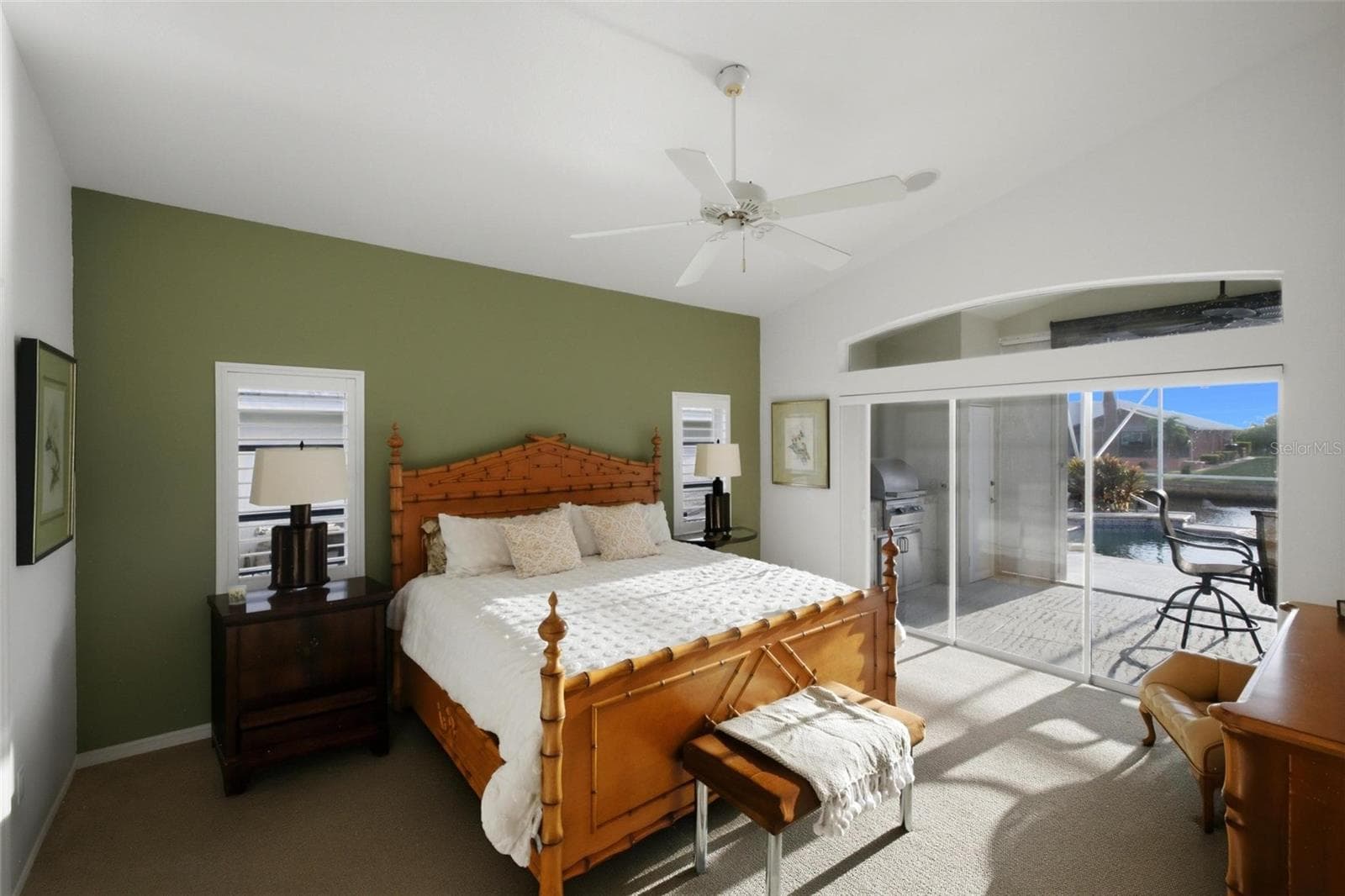 primary bedroom has enough room for a king bed, dresser, two nightstands and a chair with plenty of room to maneuver throughout. - 209 DIVINCI DR, PUNTA GORDA