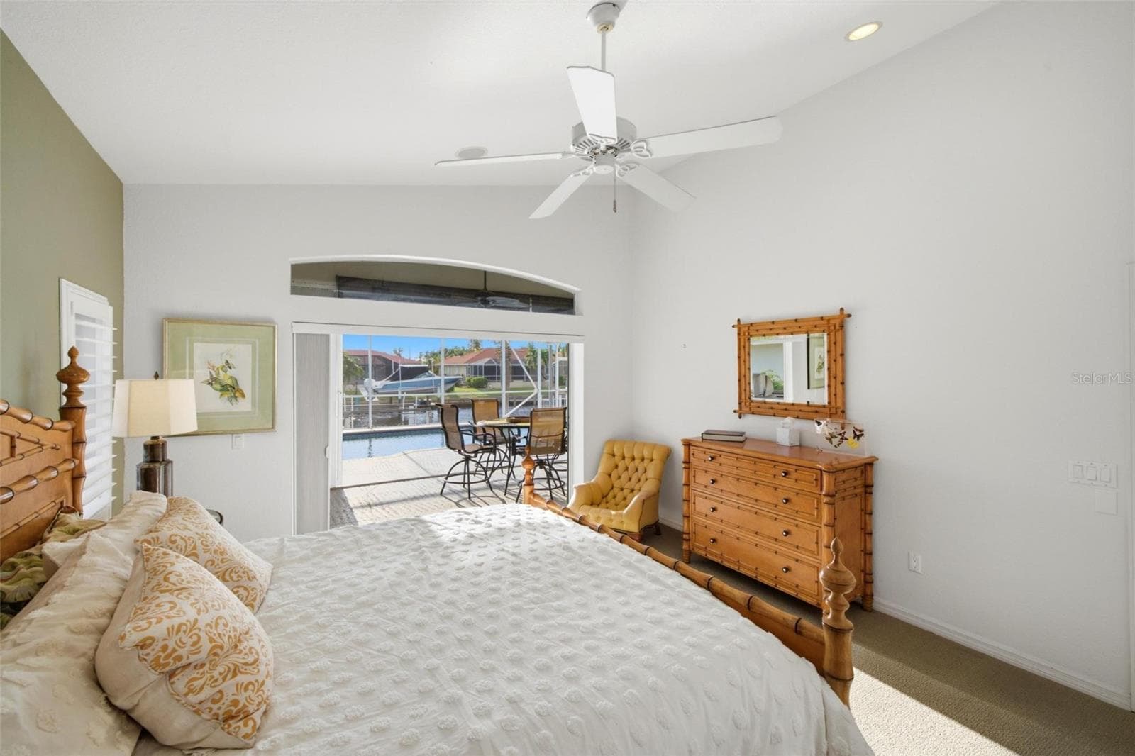 slider to lanai brings so much light and air to this room.  Over door transom and two additional windows complete this room. - 209 DIVINCI DR, PUNTA GORDA