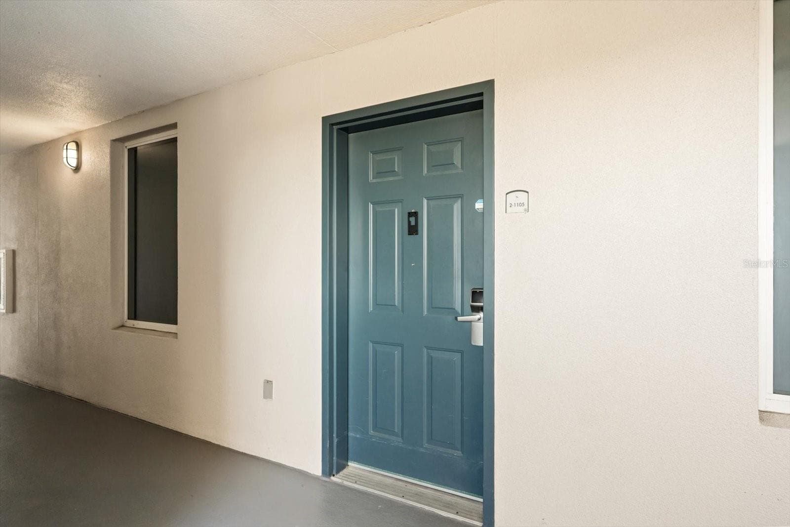 UNIT #2-1105 FRONT DOOR - 13427 BLUE HERON BEACH DR #2-1105, ORLANDO