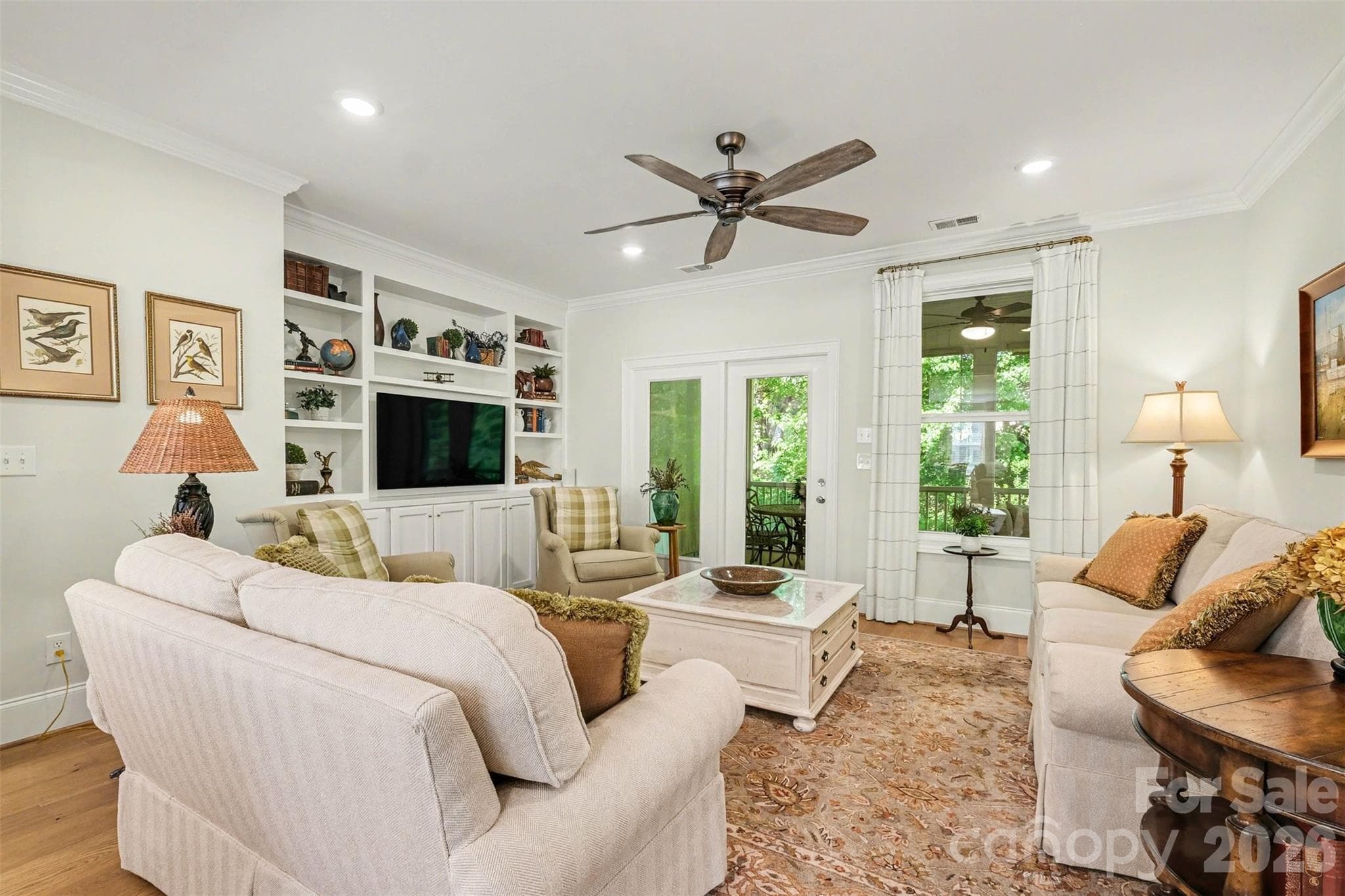 The living room opens to the screened-in porch. - 3743 Keyworth Way, Indian Land