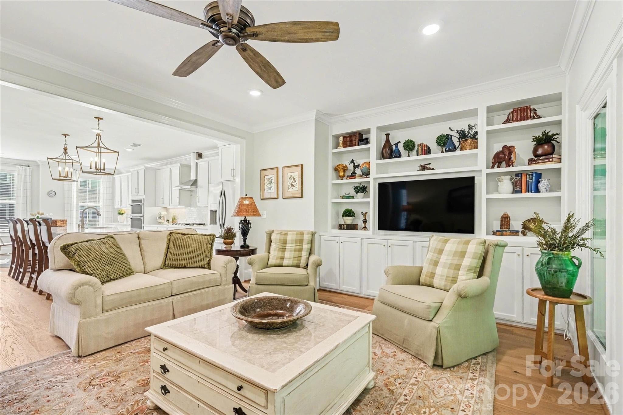 The living room has custom built-ins, offering abundant storage and shelf space. - 3743 Keyworth Way, Indian Land